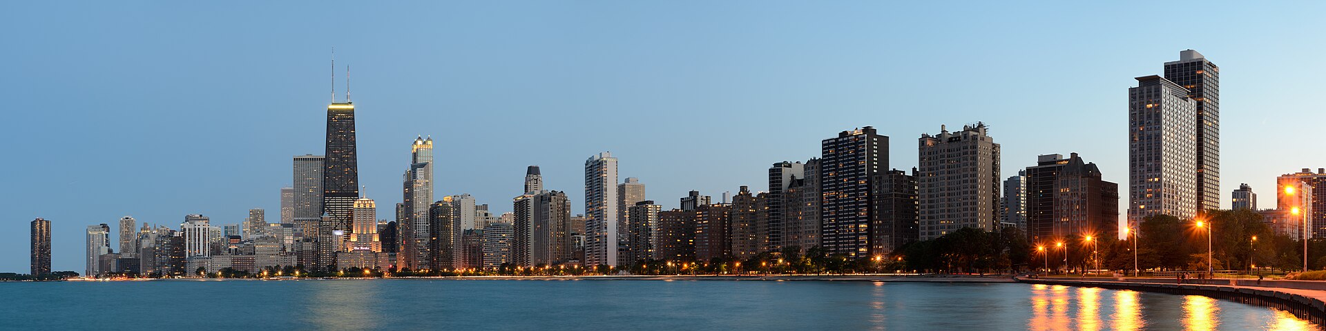 Panorama of the Chicago skyline as viewed from North Avenue Beach at dusk