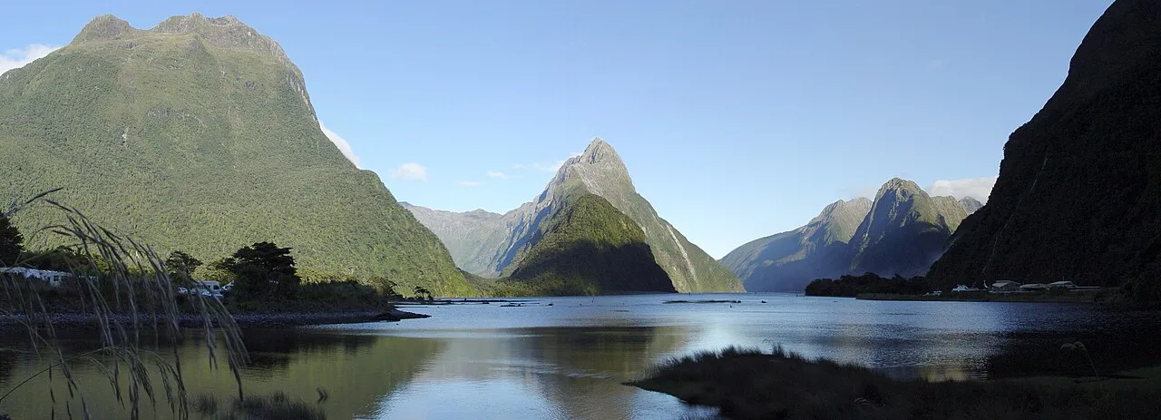 Milford Sound fiord with Bowen Falls cascading into the water, Fiordland New Zealand