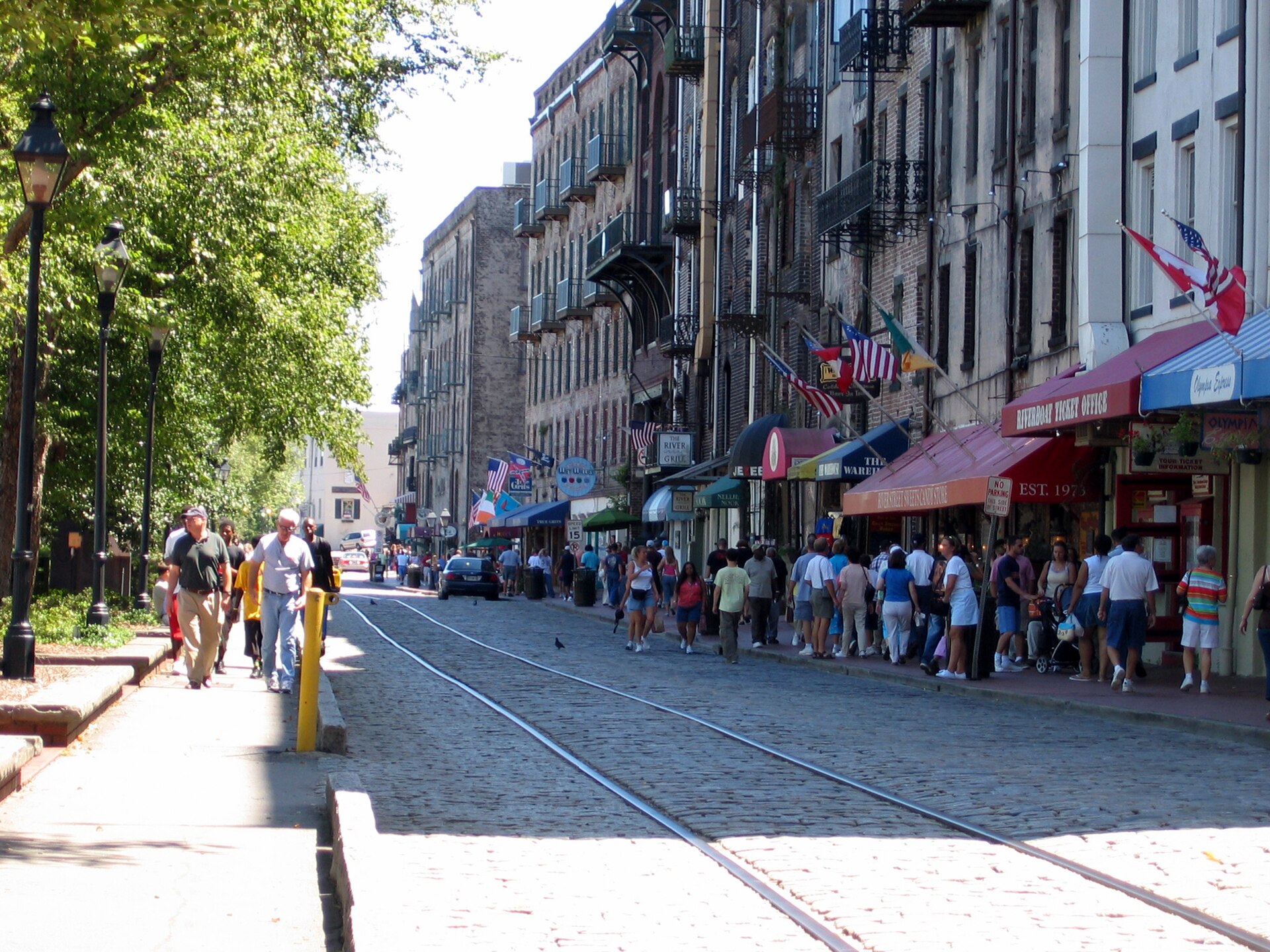 River Street in Savannah with cobblestones and converted cotton warehouses along the Savannah River