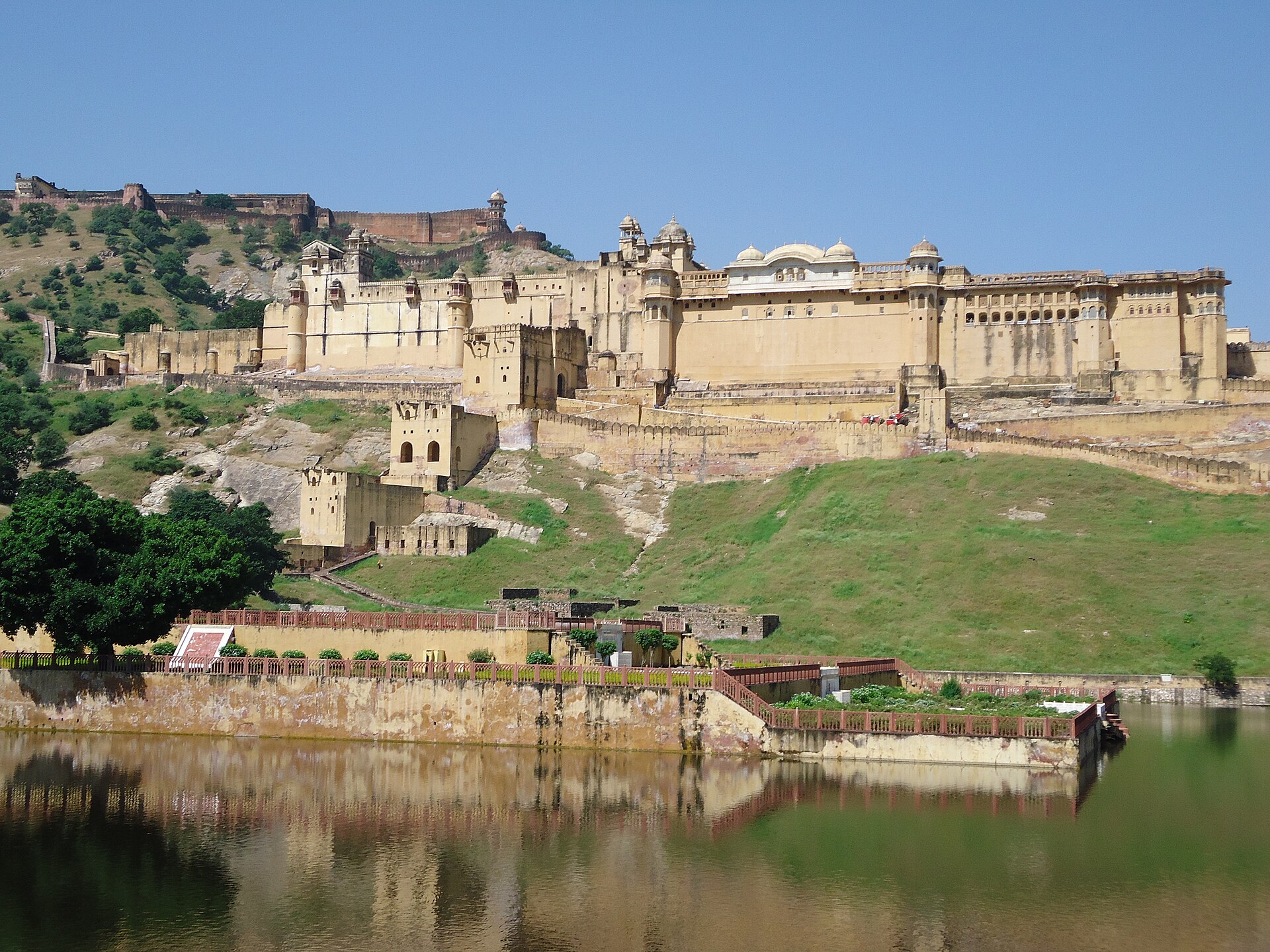 Amber Fort and its reflection in Maota Lake below the Aravalli Hills