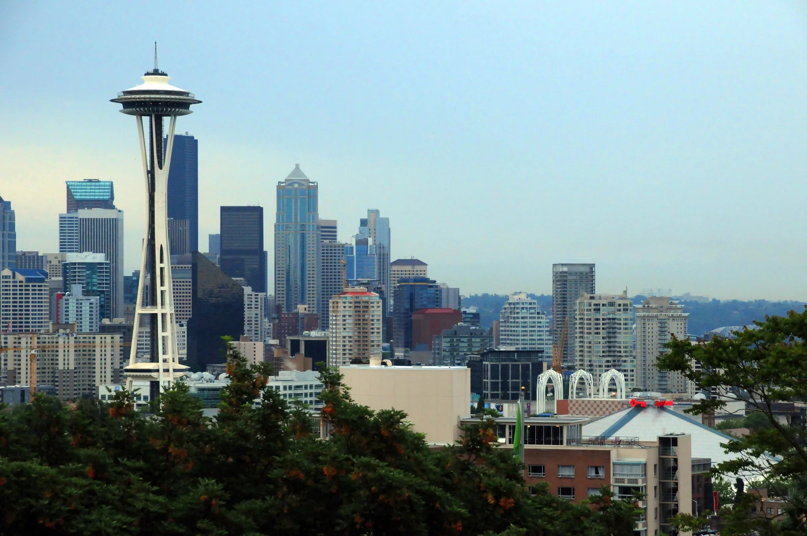 The Space Needle rising among downtown Seattle high-rise towers, seen from the Kerry Park overlook