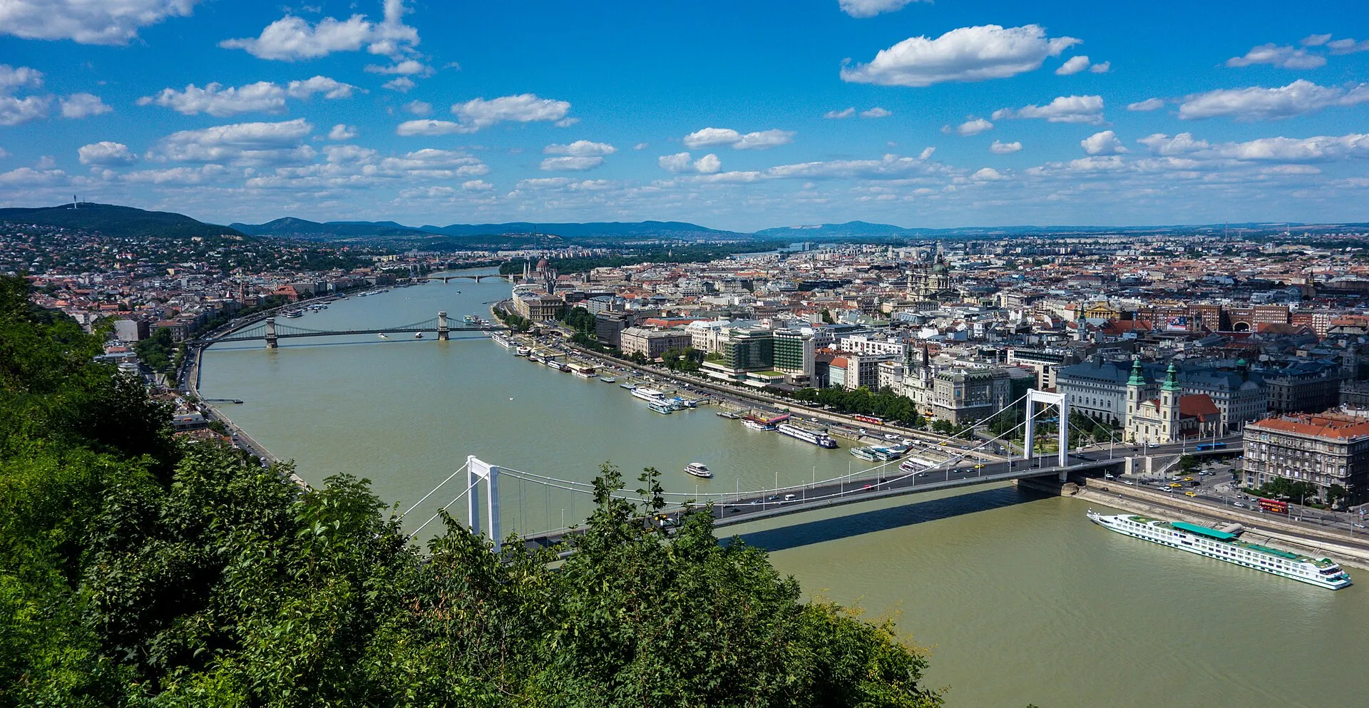 View from Gellért Hill across the Danube towards the Hungarian Parliament building at dusk, Budapest