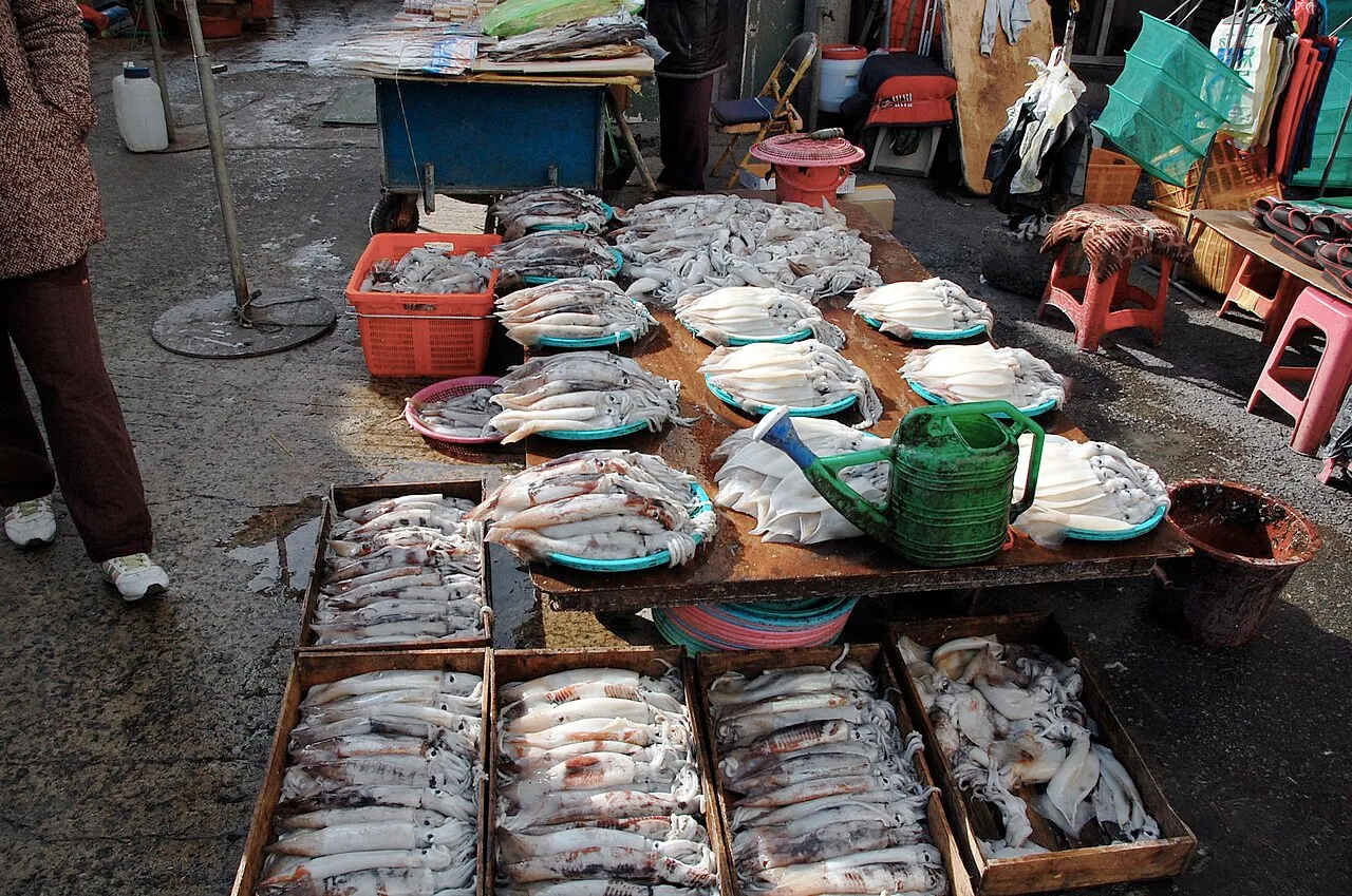 Jagalchi Fish Market open-air stalls and vendors along the harbour waterfront in Busan