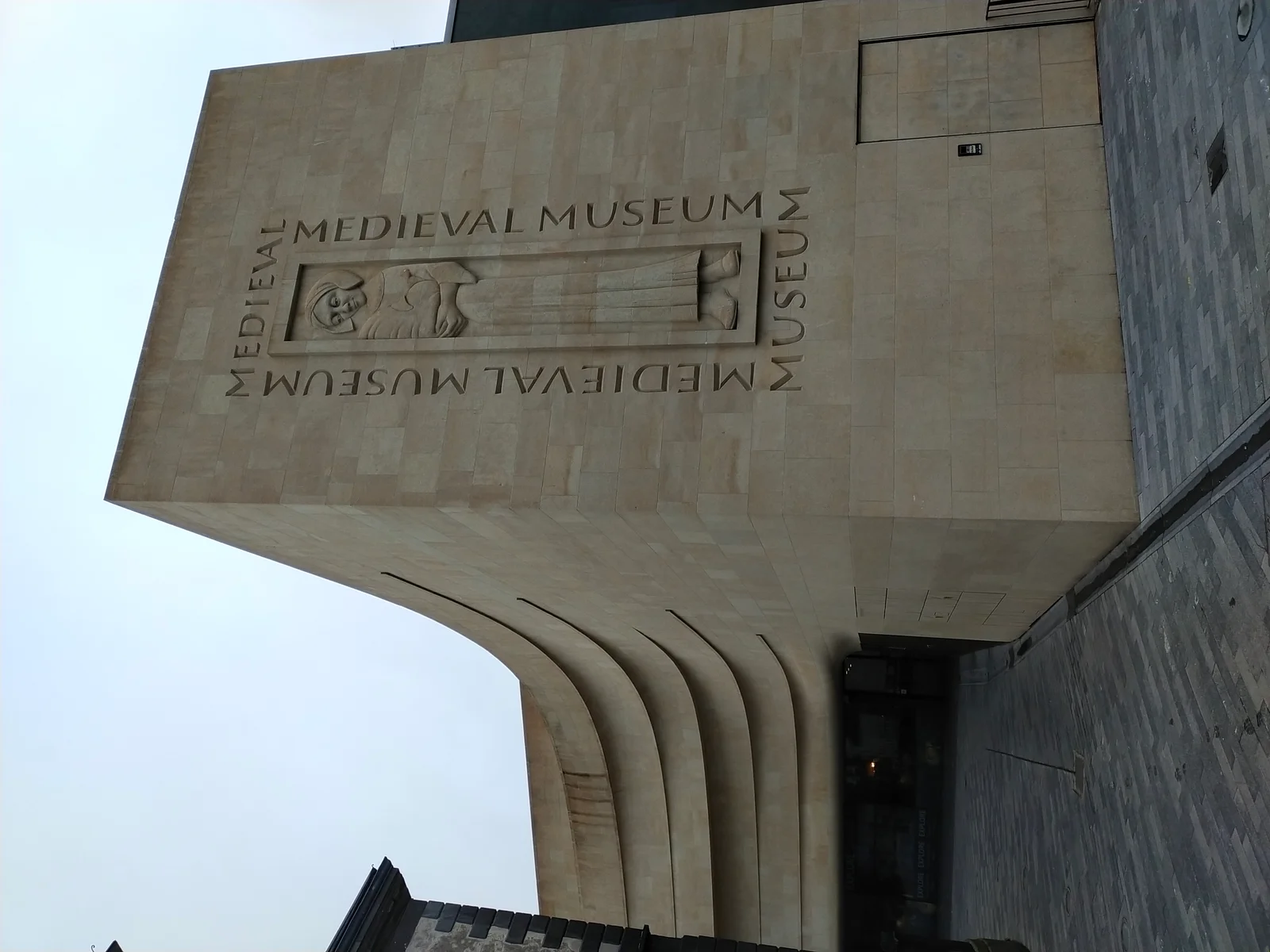The modern stone frontage of the Medieval Museum in Waterford's Viking Triangle