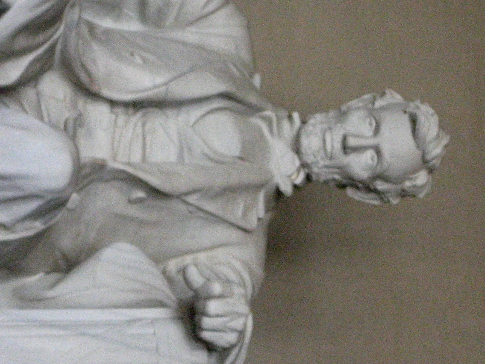 The seated white marble statue of Abraham Lincoln inside the Lincoln Memorial chamber