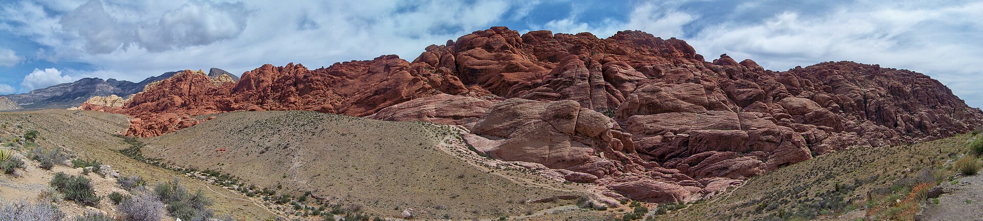 Panoramic view of the Calico Hills at Red Rock Canyon with red and cream sandstone formations