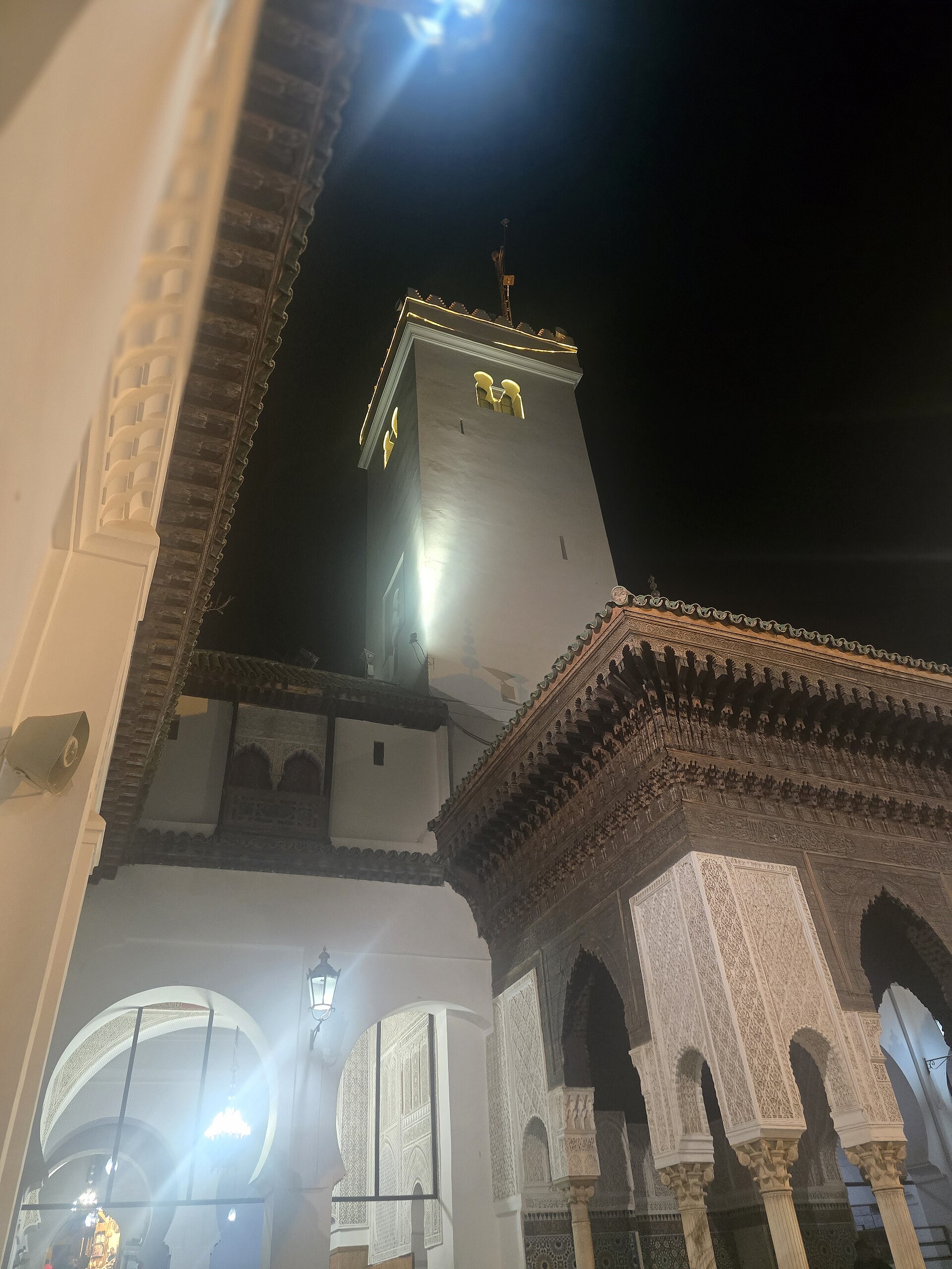 Courtyard of Al-Qarawiyyin University in Fez with green-tiled fountain