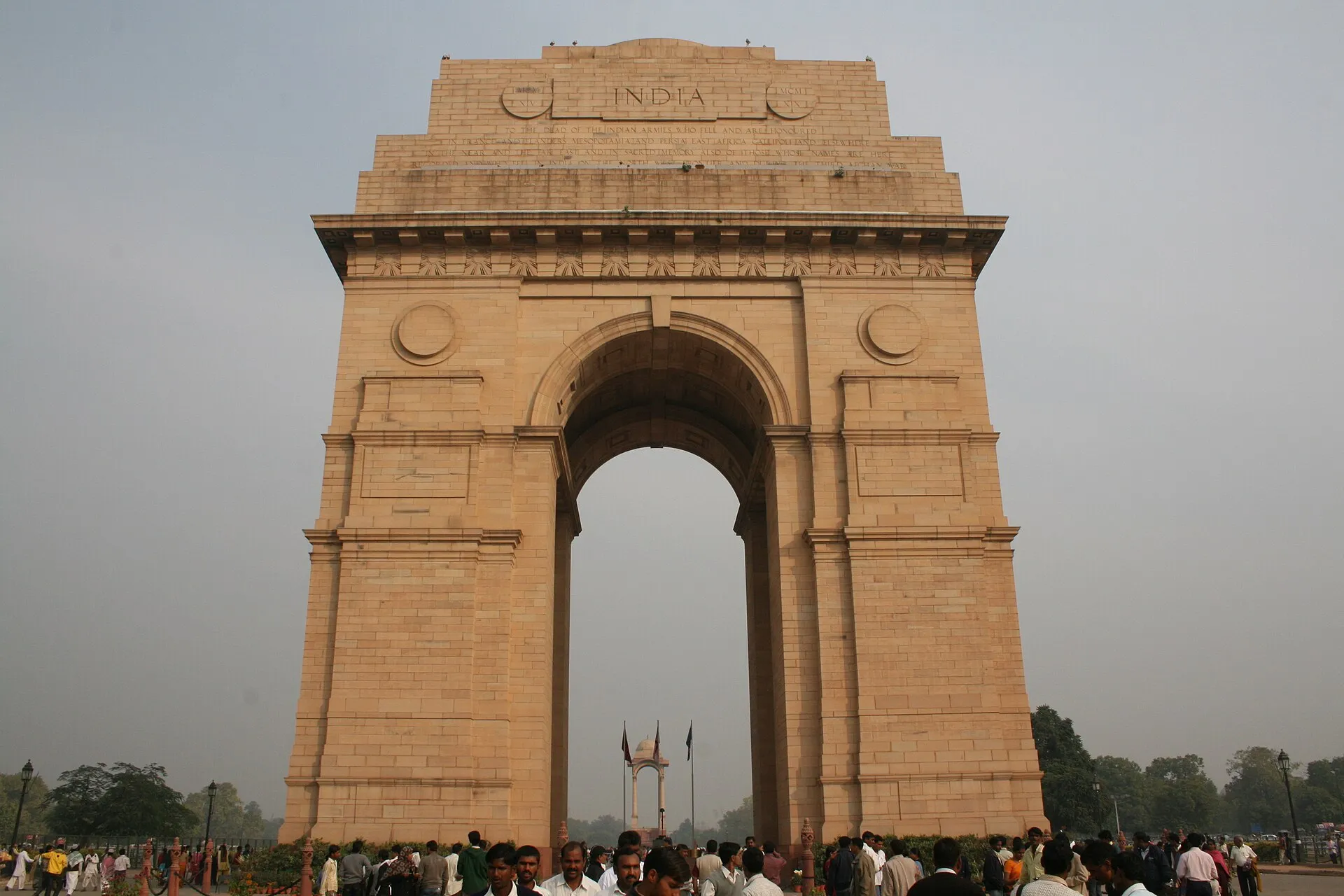 India Gate monument illuminated against the Delhi sky