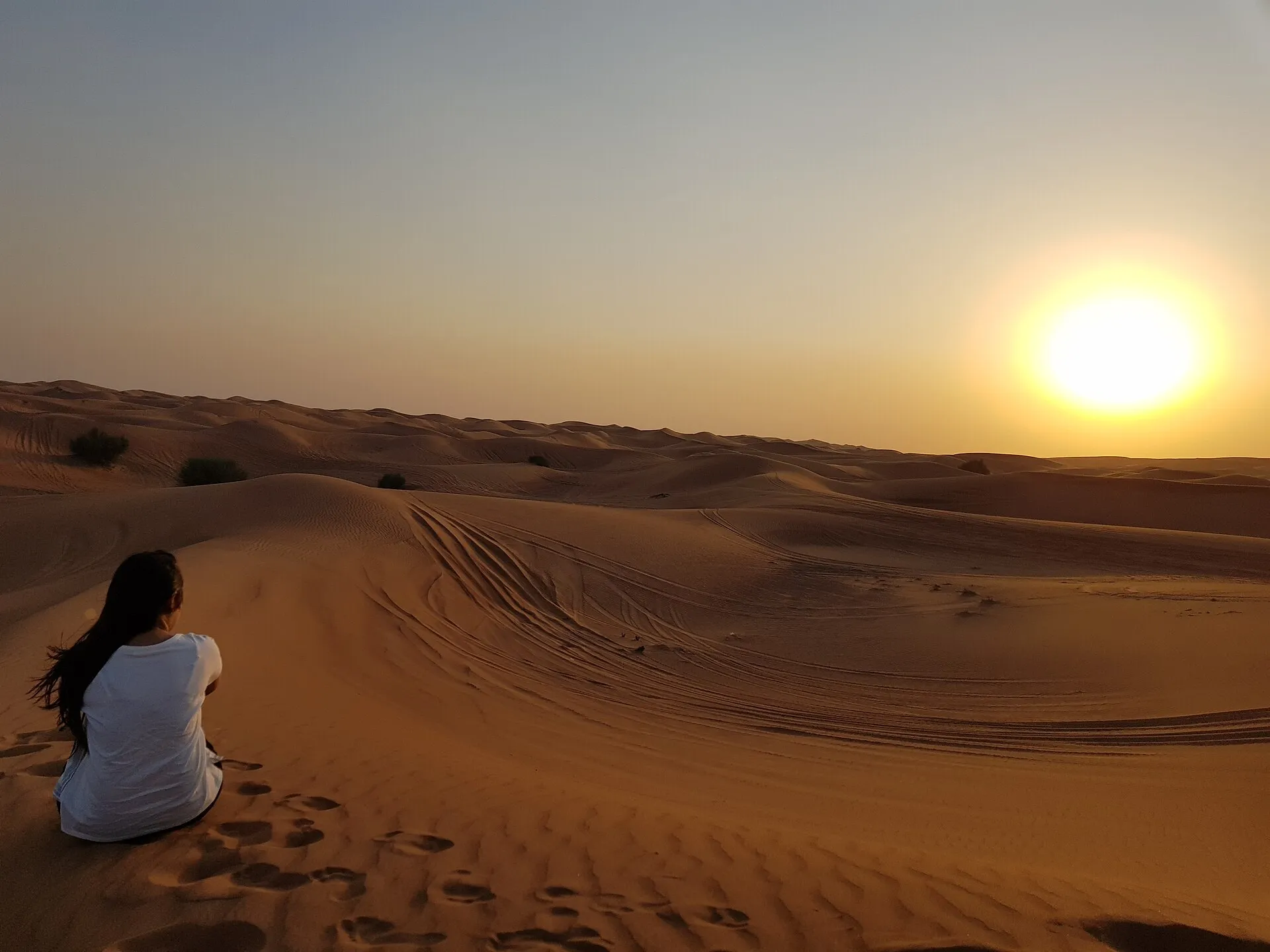 Sunset over the dunes during a desert safari near Dubai