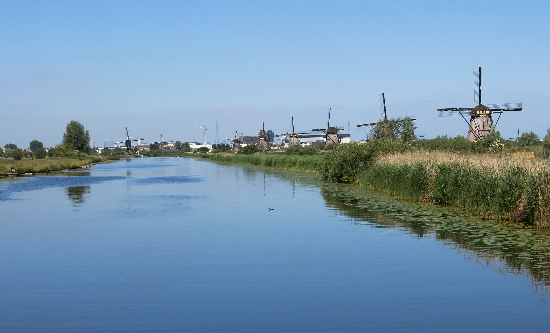 Traditional Dutch windmills along a canal at Kinderdijk in the Netherlands