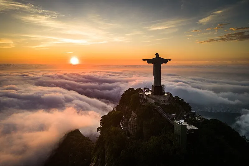 Christ the Redeemer statue rising above the clouds on Corcovado mountain, Rio de Janeiro