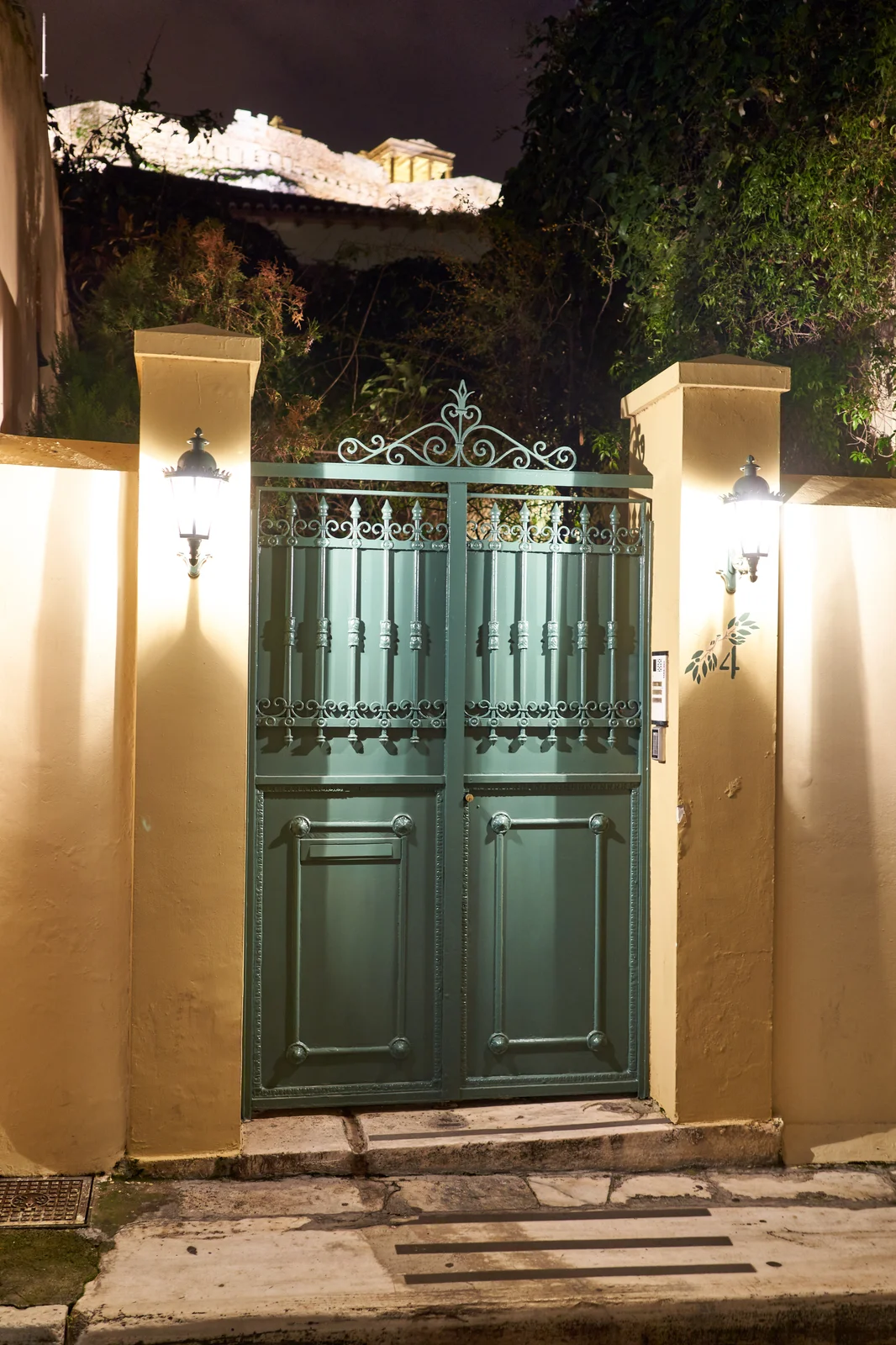 Weathered neoclassical house with shuttered windows in Plaka