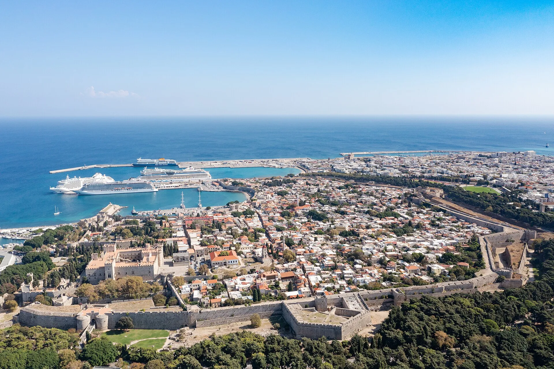 Aerial view of Rhodes Old Town with its intact medieval walls and the harbour, Greece