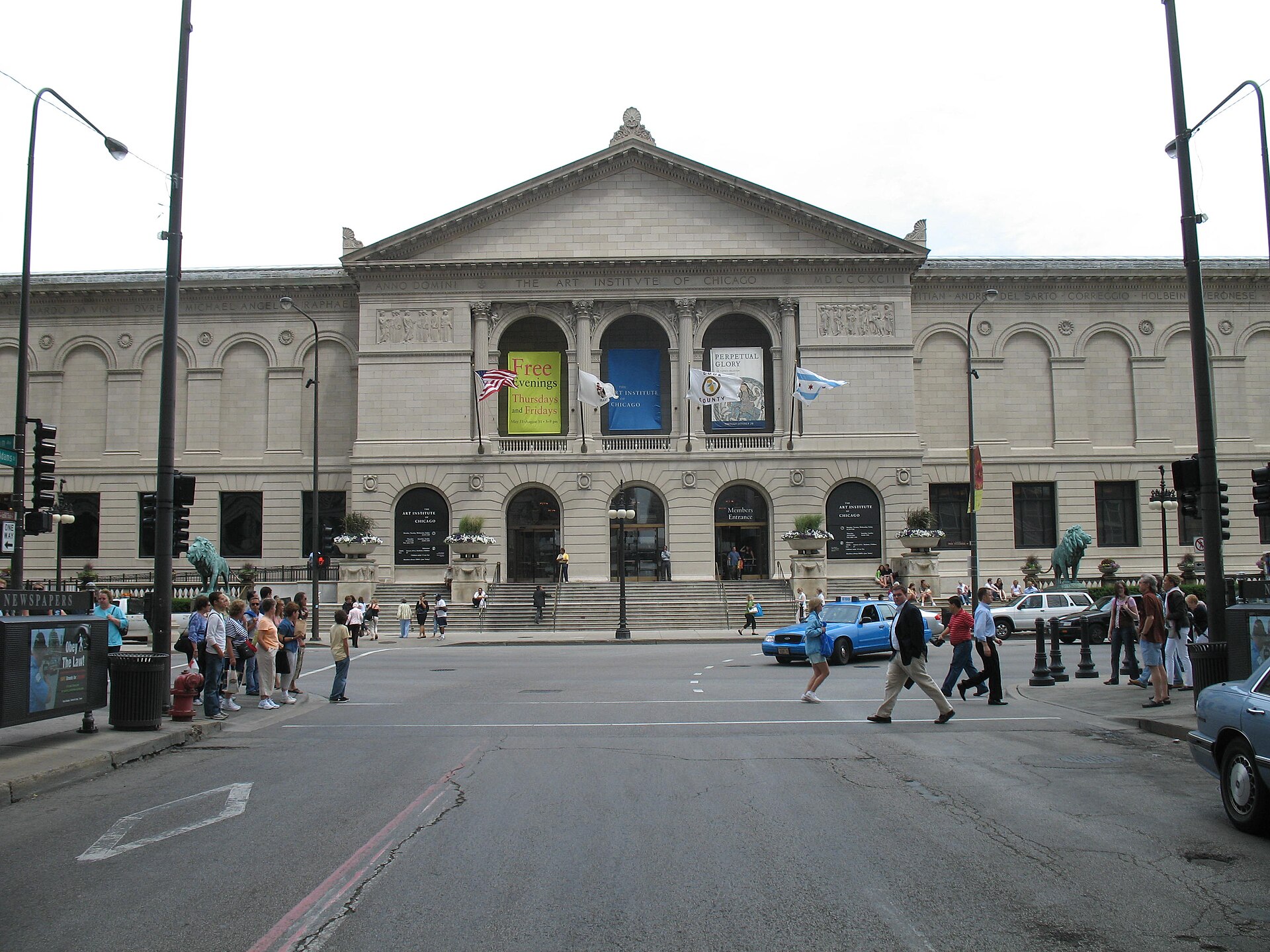 Front view of the Art Institute of Chicago with iconic lion statues flanking the entrance