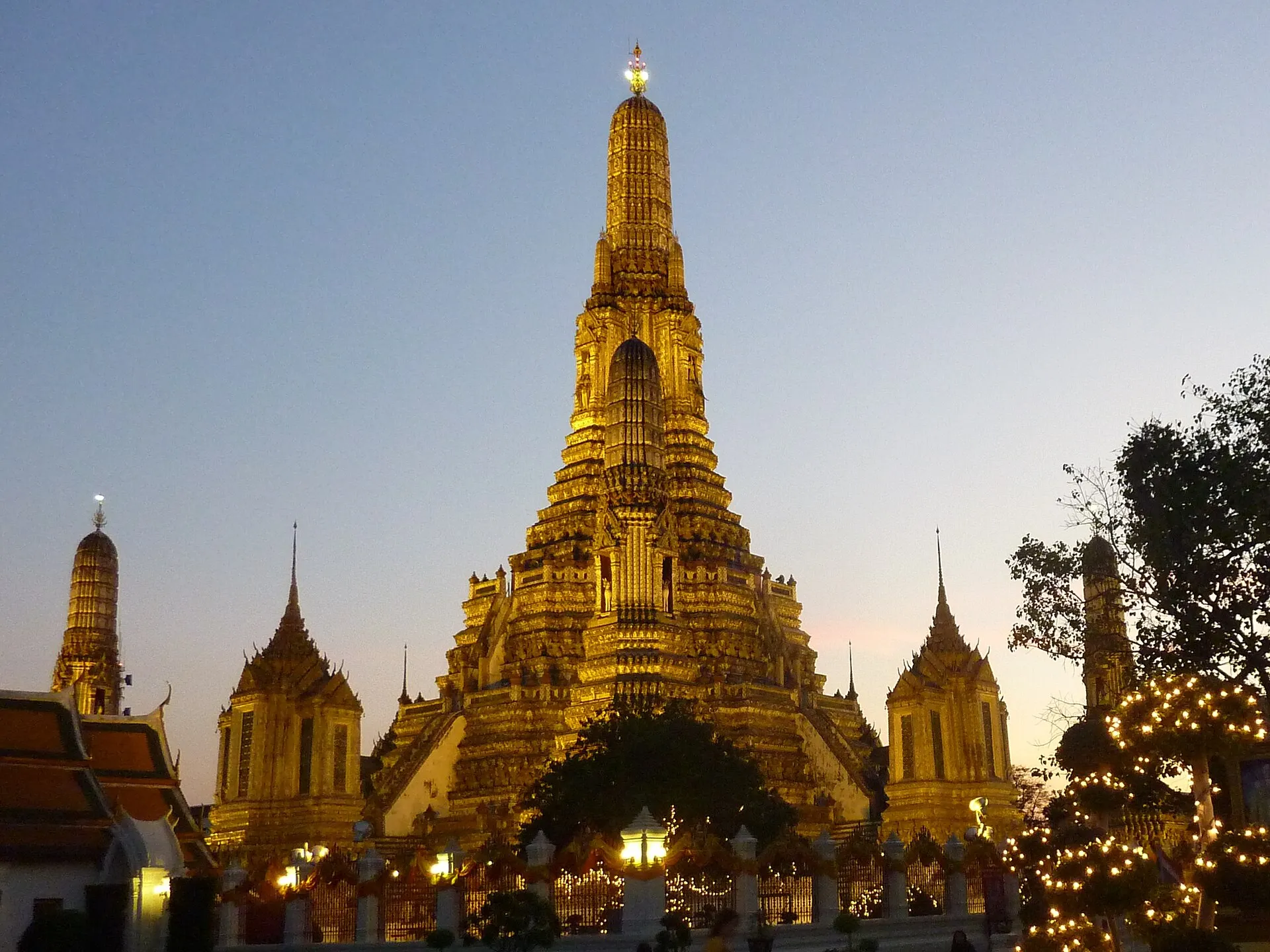 Wat Arun prang illuminated in the evening