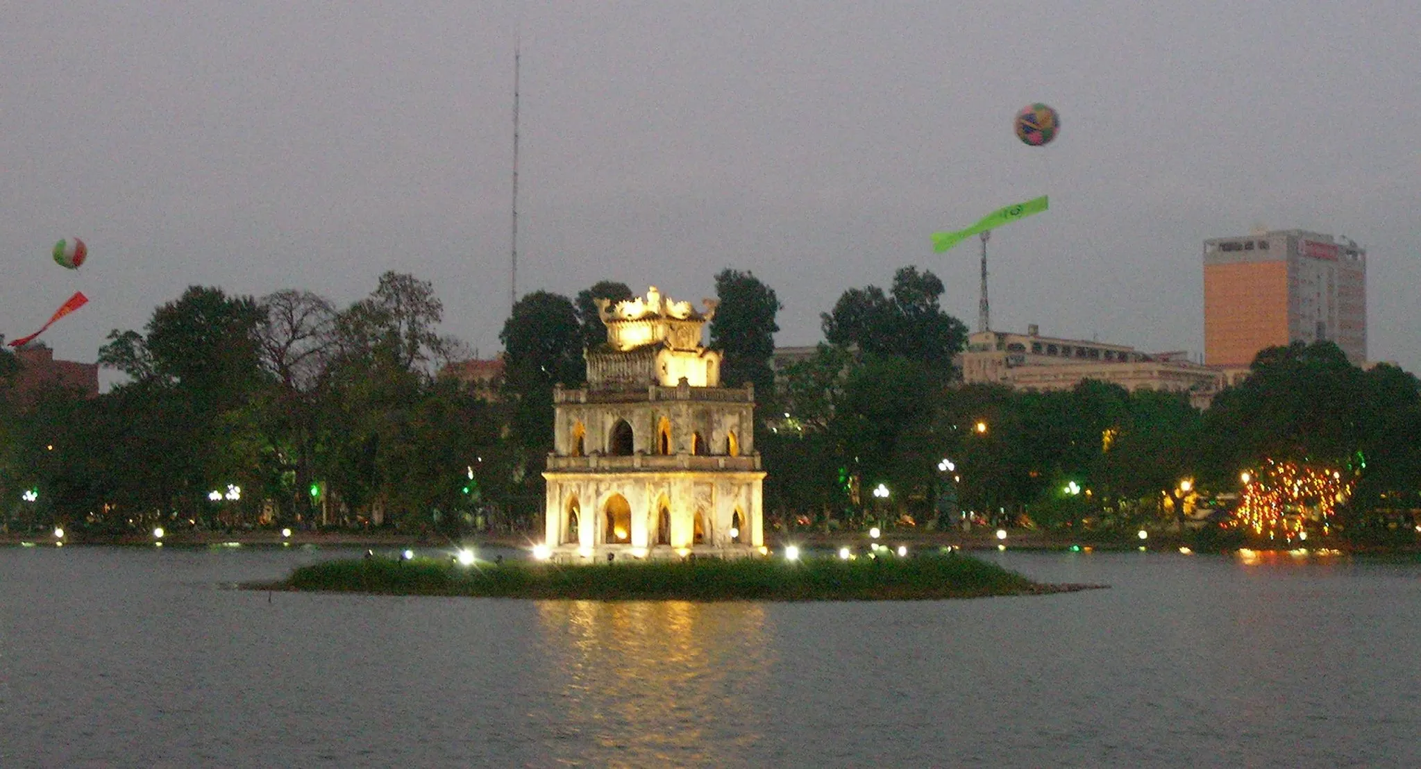 Hoan Kiem Lake with the Turtle Tower rising from the water at dawn, Hanoi, Vietnam
