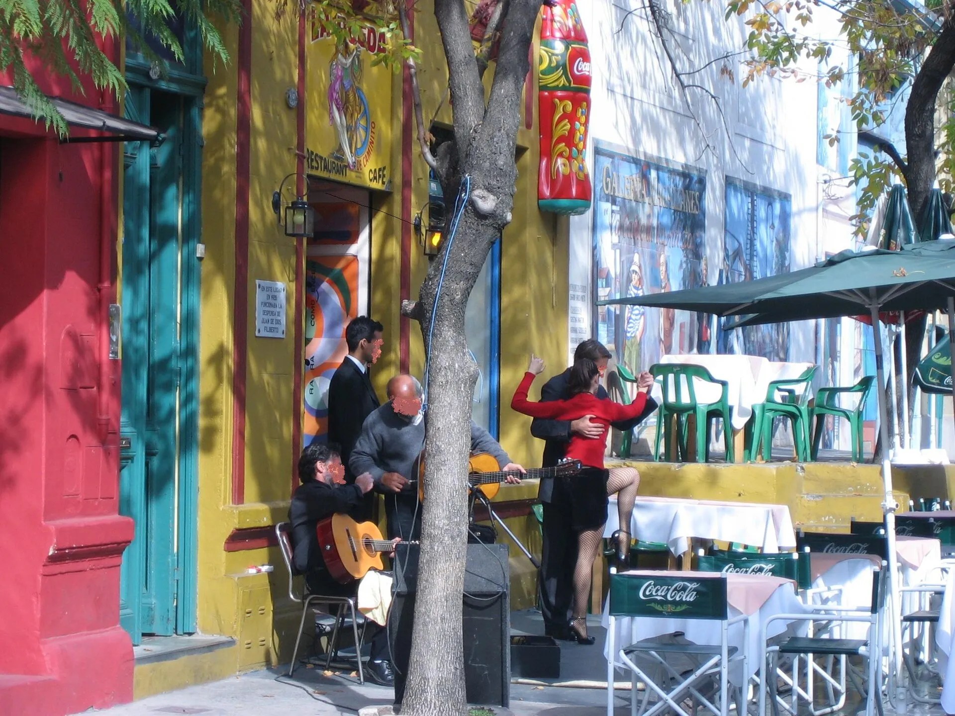 Couple dancing tango in the street at Caminito in La Boca