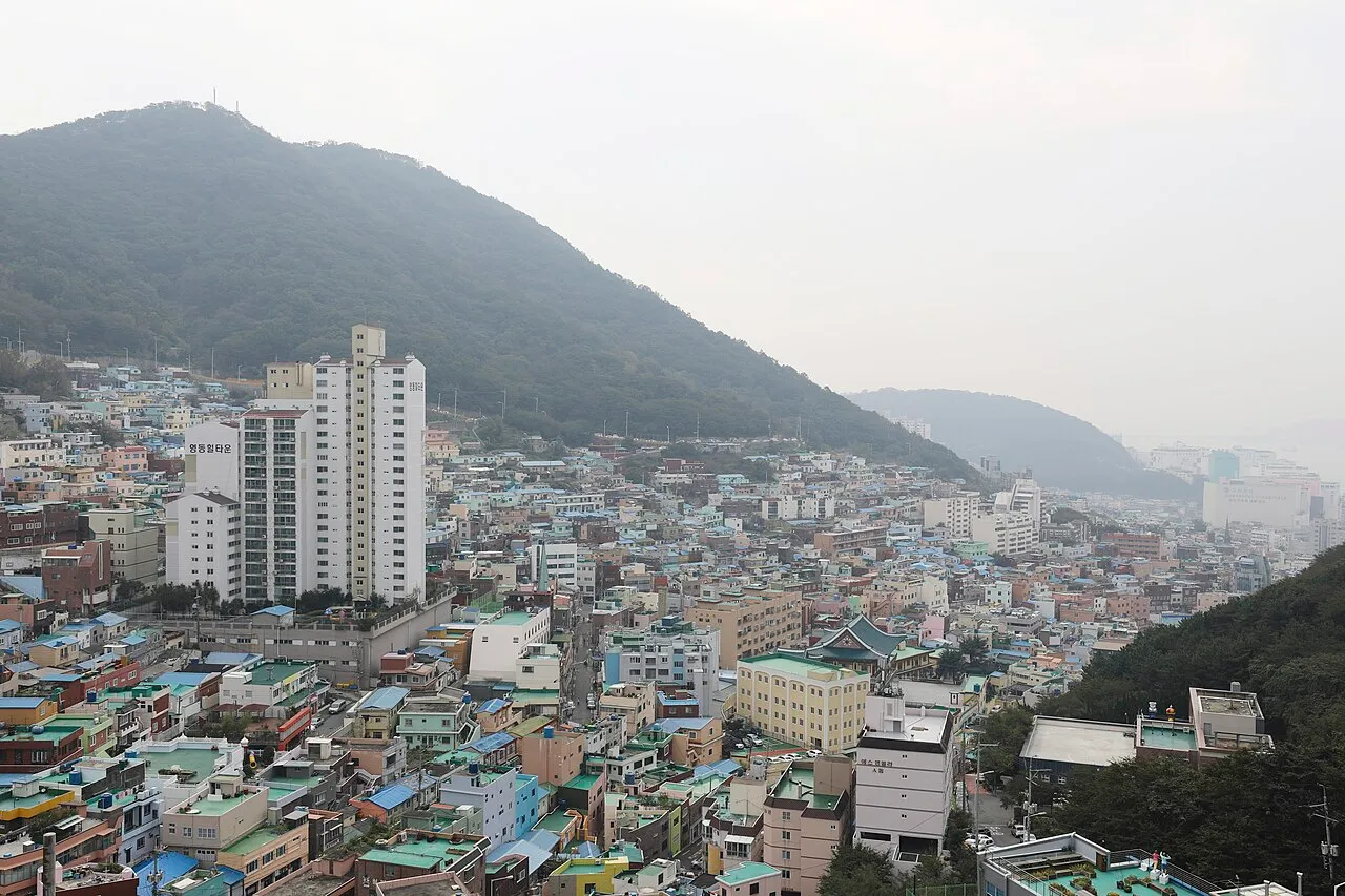 Pastel-coloured houses of Gamcheon Culture Village cascading down a hillside in Busan