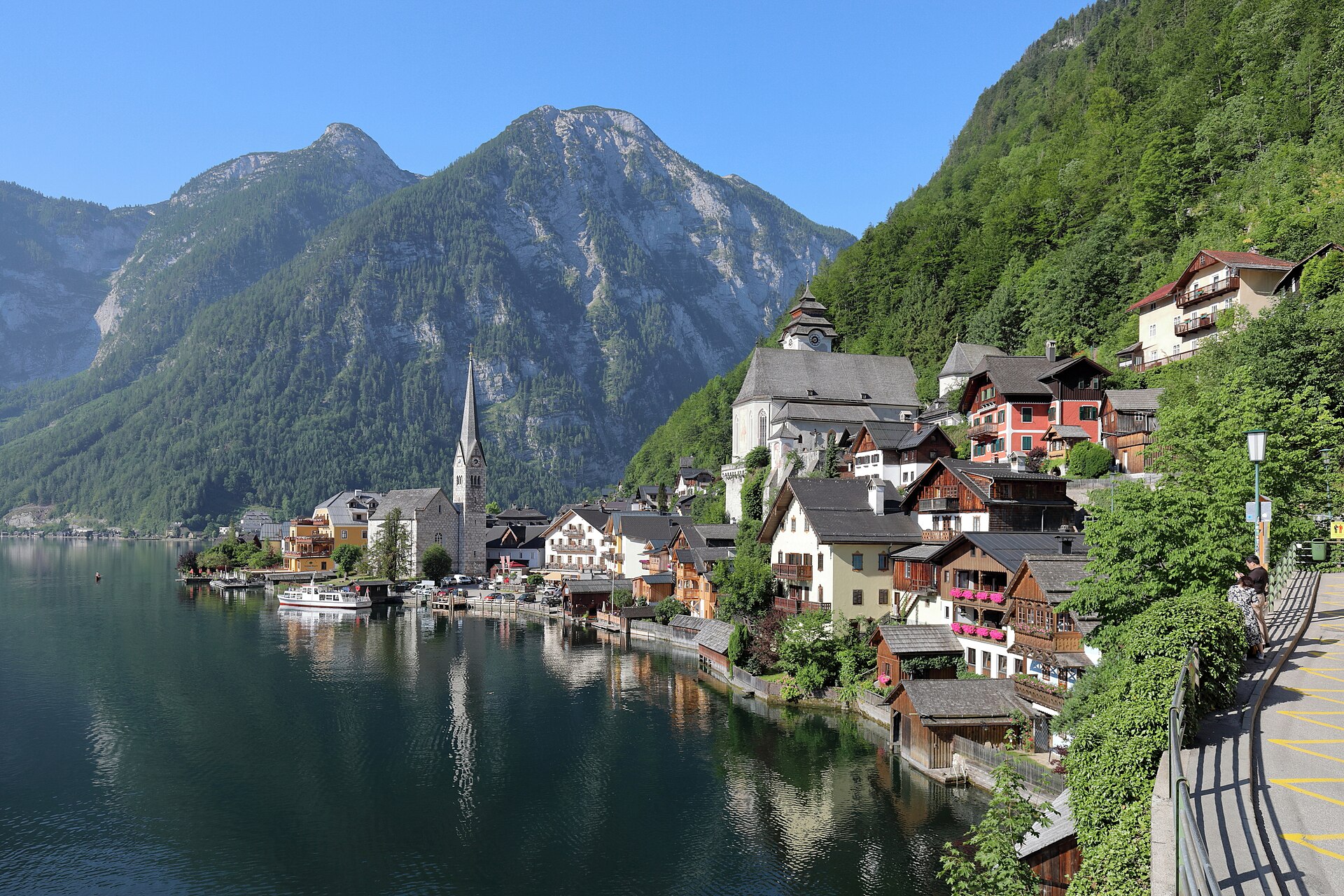 Panoramic northeast view of Hallstatt village nestled between the lake and steep Alpine mountains in Upper Austria