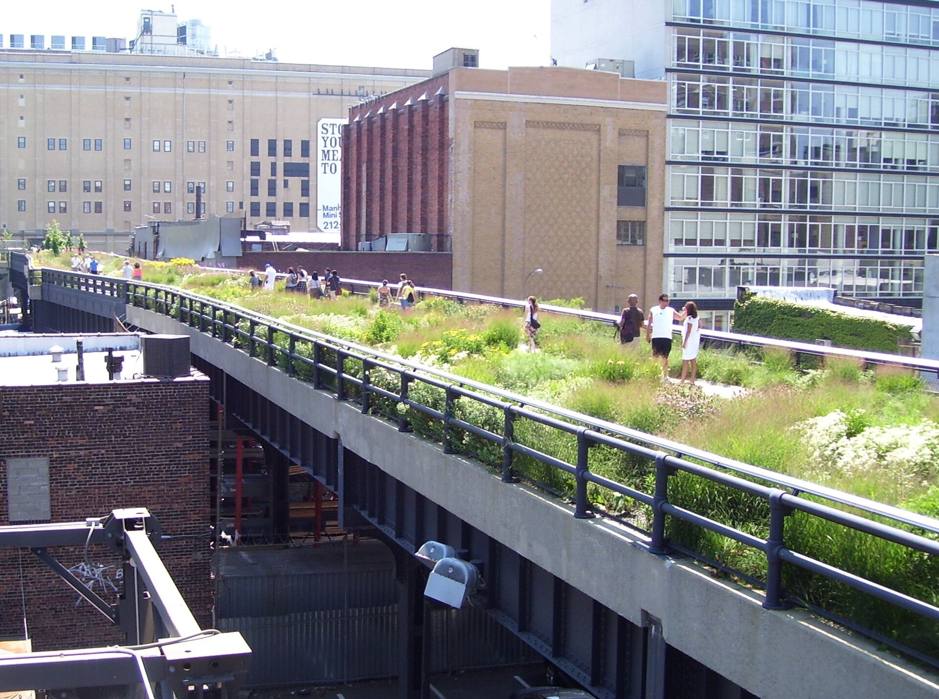 The High Line elevated park at West 20th Street looking downtown with lush plantings