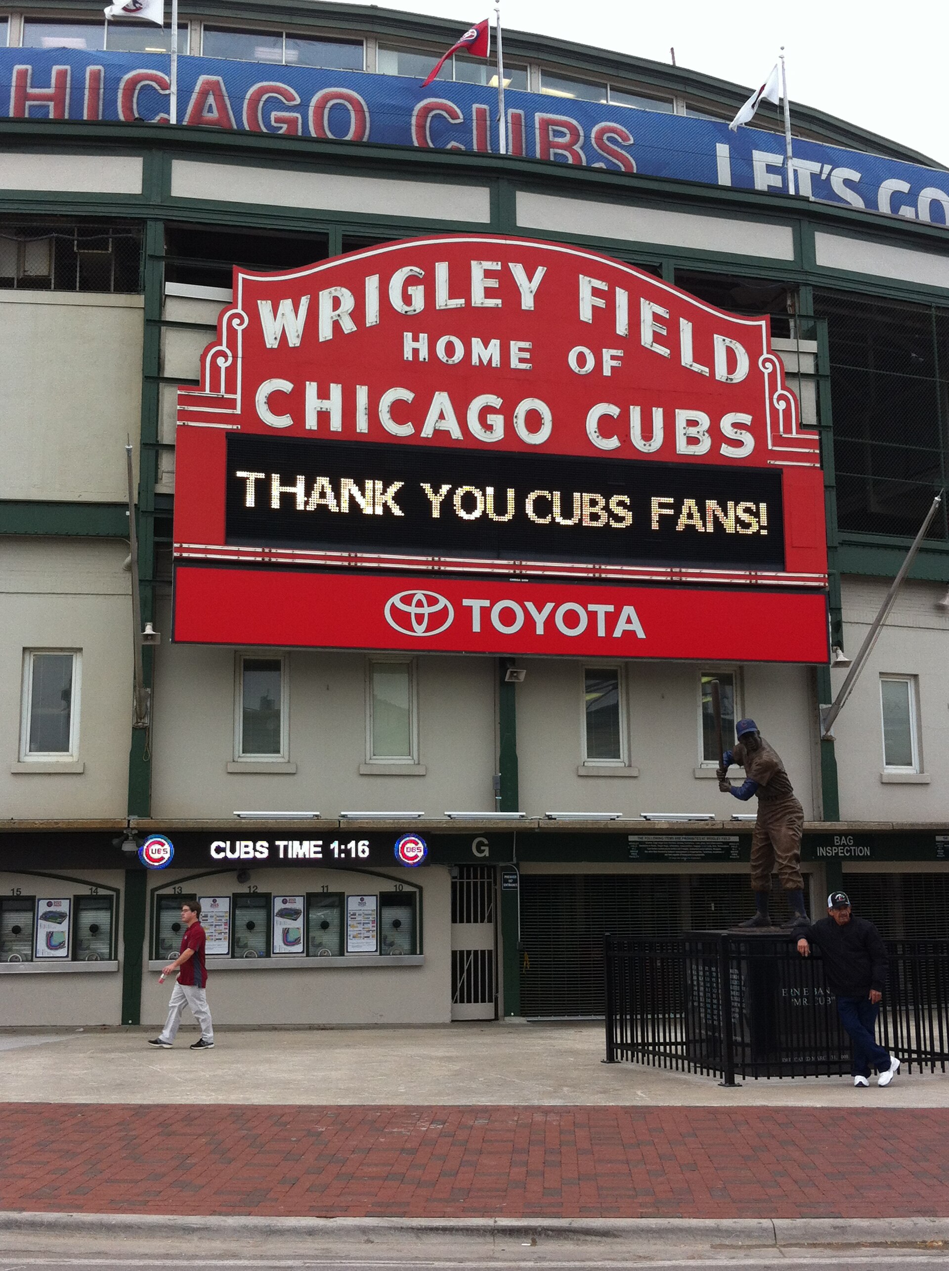 The iconic Wrigley Field marquee sign at the entrance to the Chicago Cubs stadium