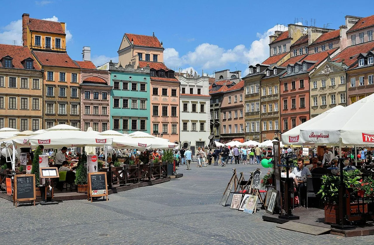 Old Town Market Square in Warsaw, Poland, with colourful historic tenement houses