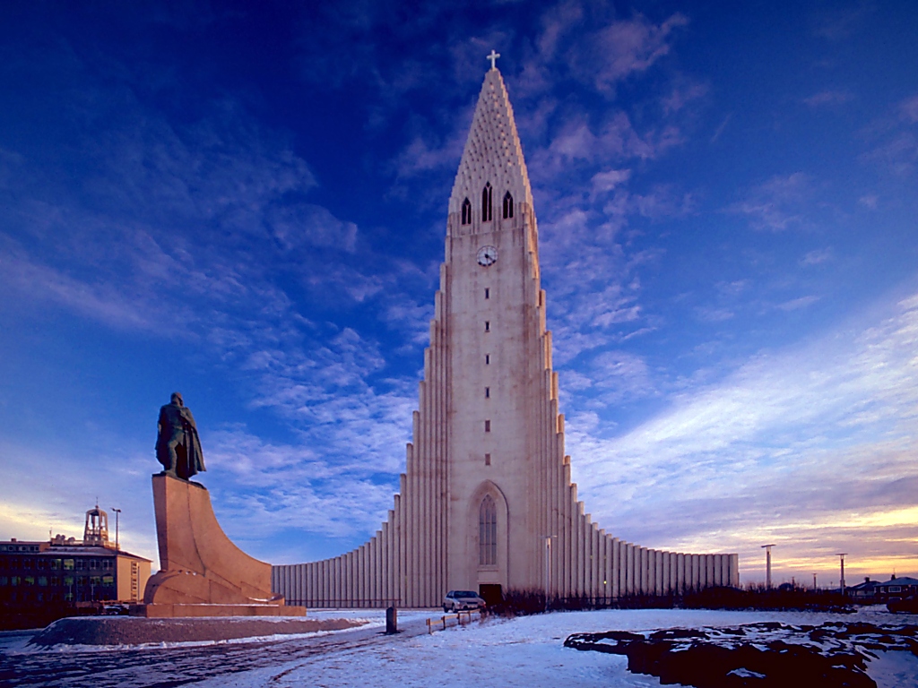 Hallgrímskirkja church rising above Reykjavik's low rooftops seen from Skólavörðustígur street