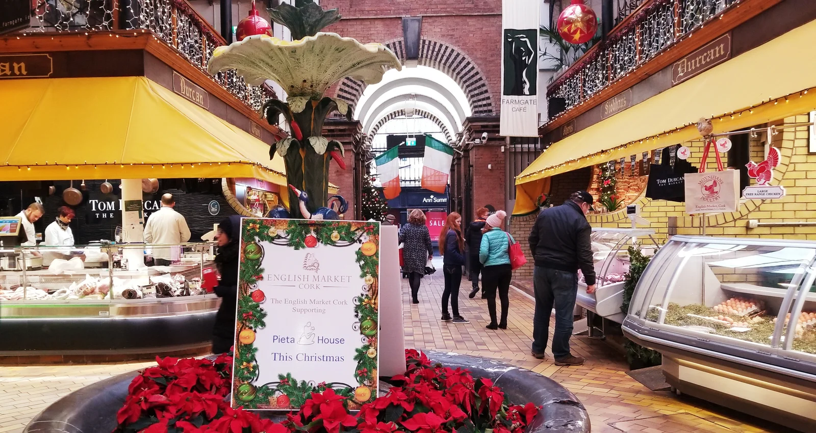 The vaulted interior and produce stalls of the English Market covered food hall in Cork