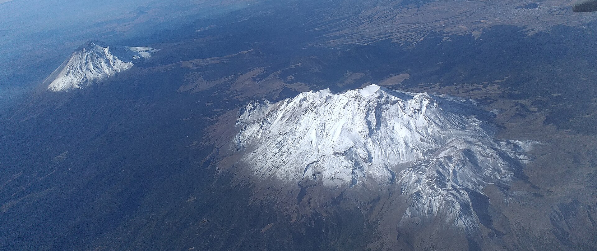 Aerial view of the Iztaccihuatl and Popocatepetl volcanoes in central Mexico