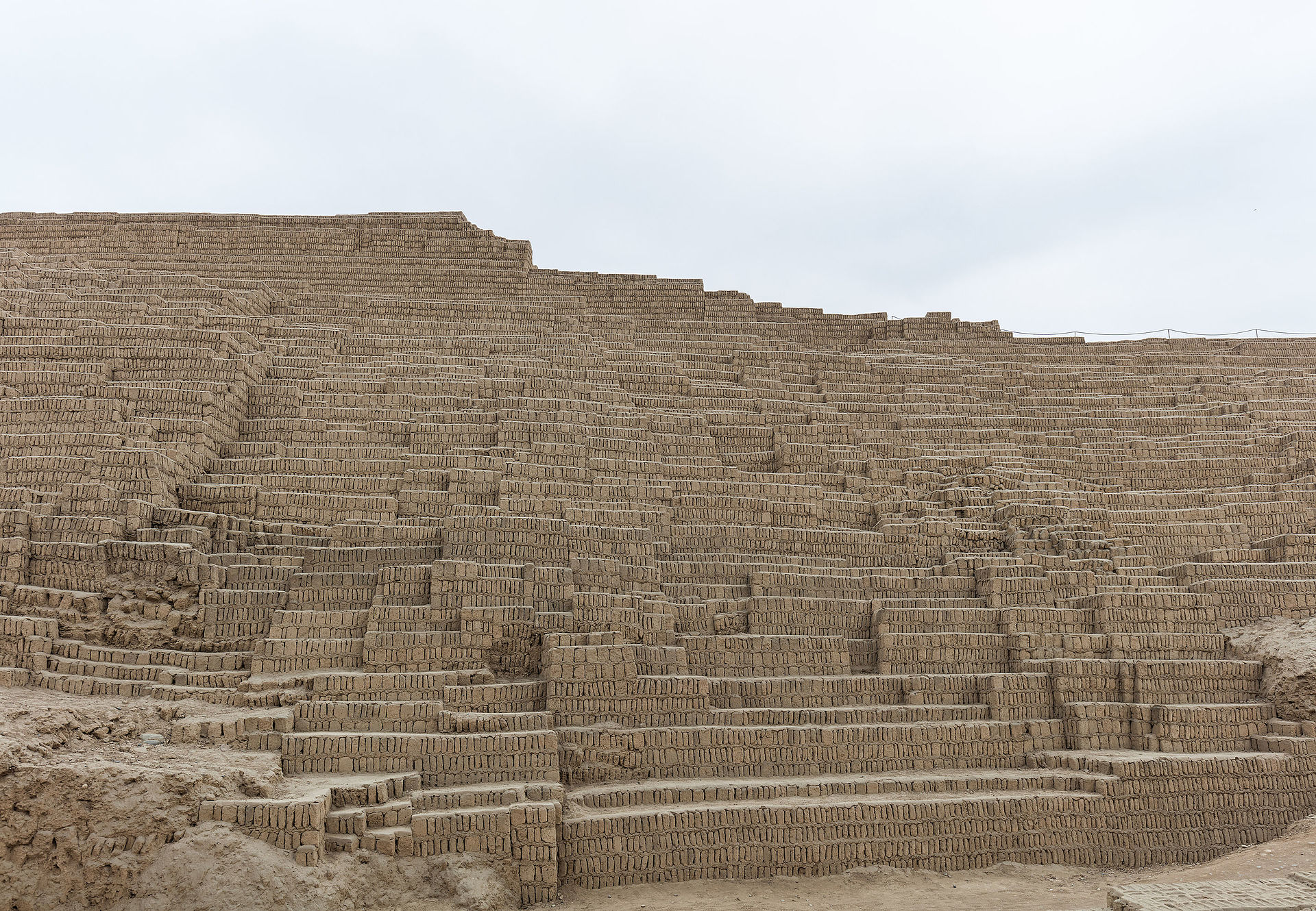 Huaca Pucllana, an illuminated ancient adobe pyramid ruin in the Miraflores district of Lima, Peru