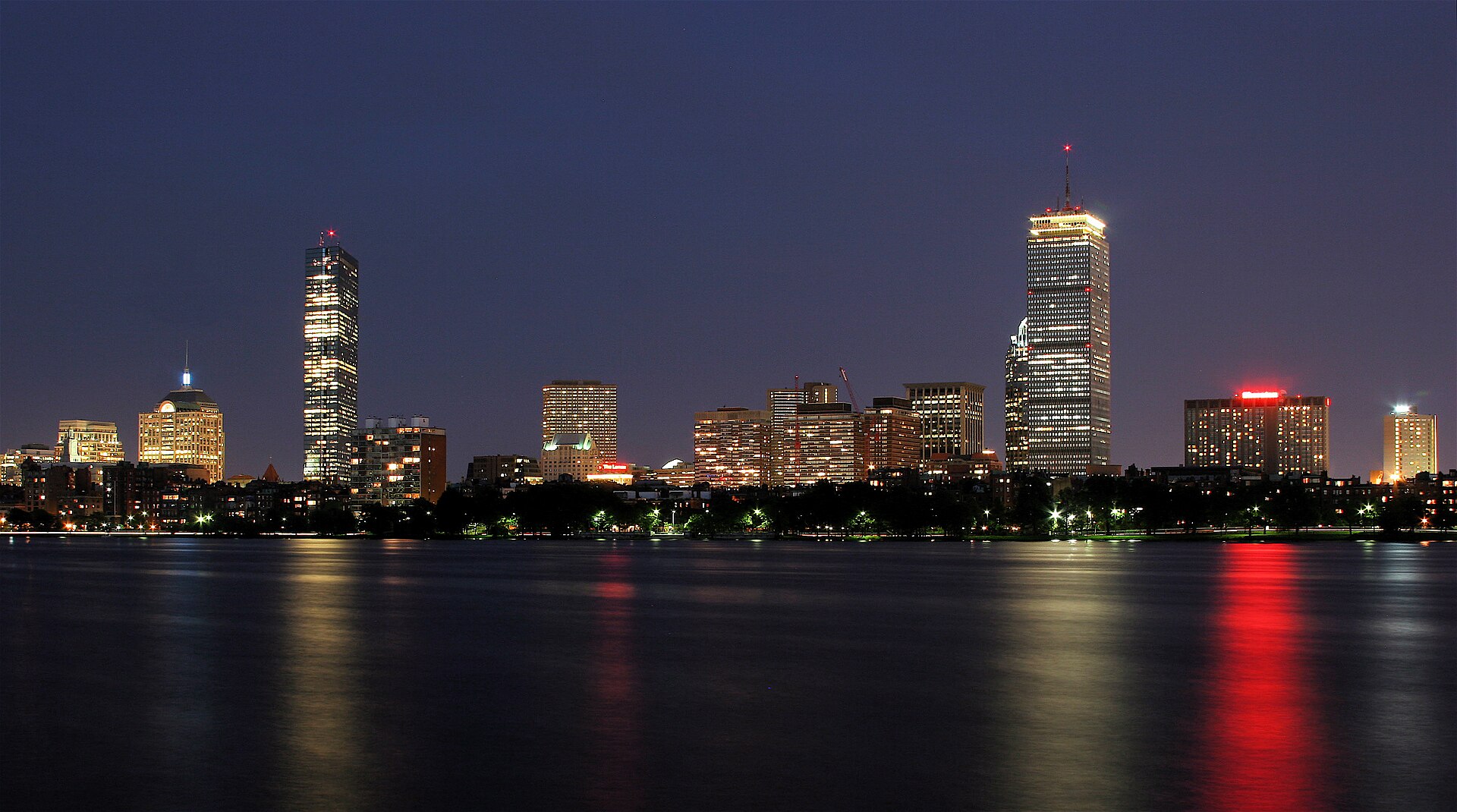 Boston skyline at night as seen from across the Charles River in Cambridge