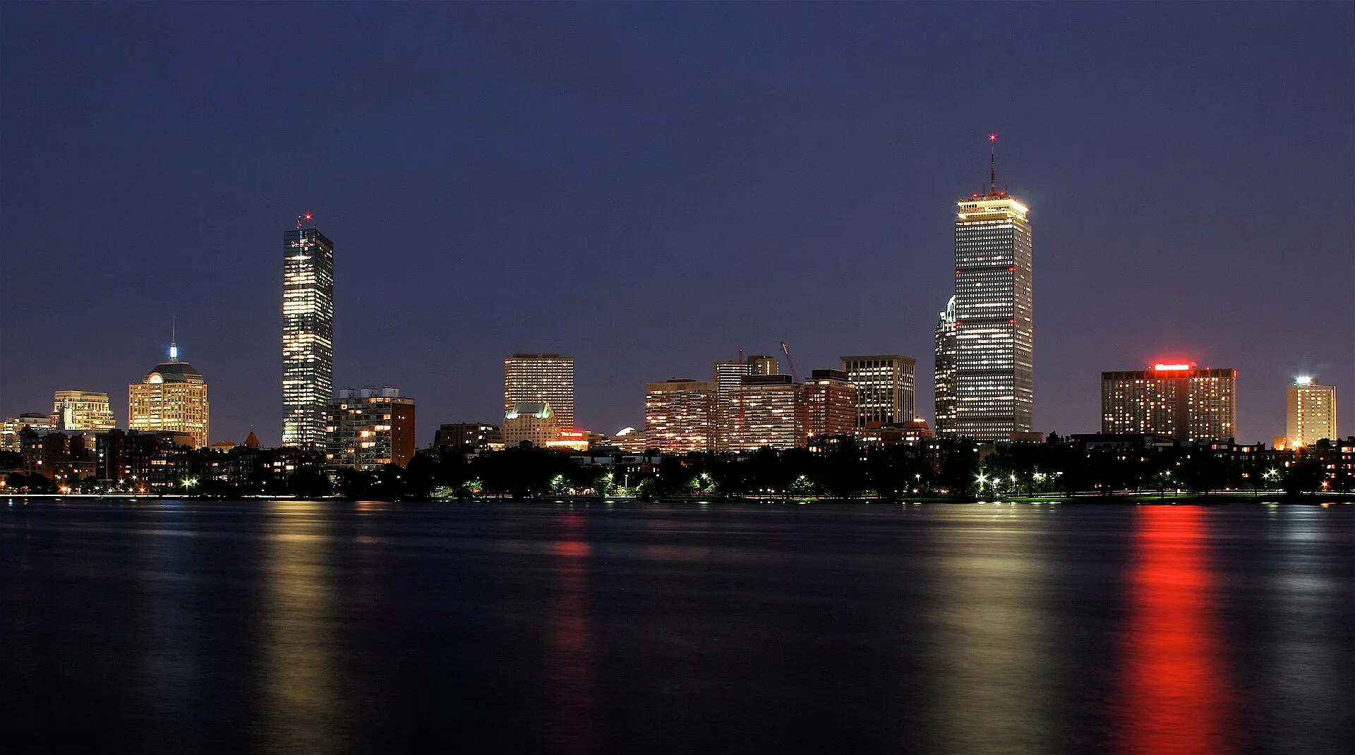 Boston skyline at night as seen from across the Charles River in Cambridge