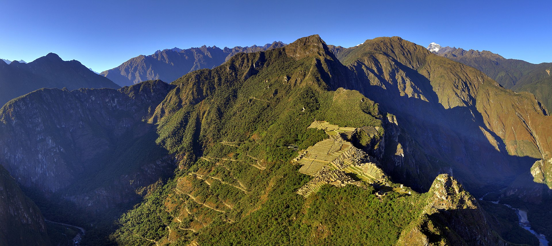 Panoramic view of Machu Picchu and surrounding mountains seen from Wayna Picchu, Peru