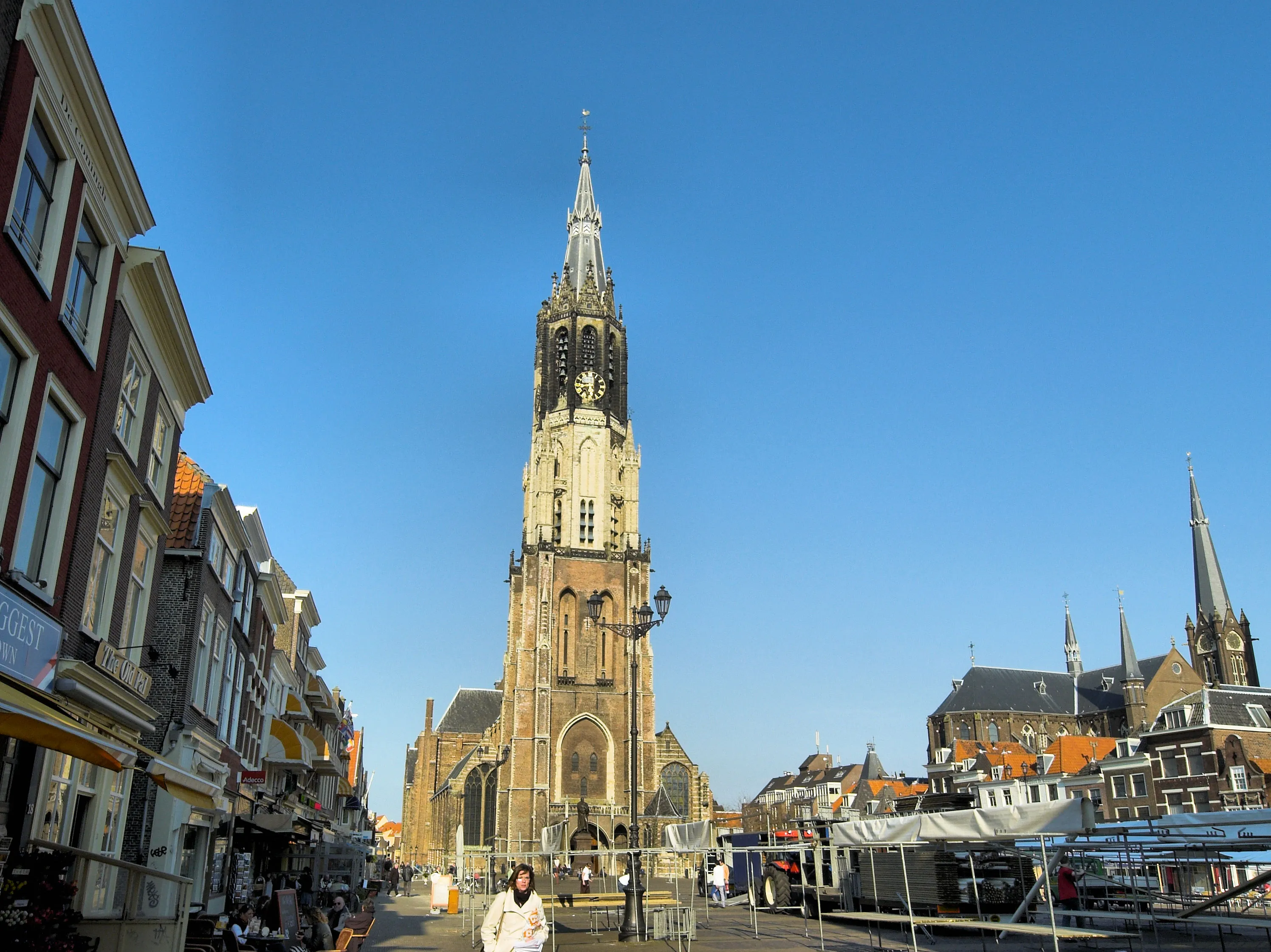 The Markt square in Delft with the Nieuwe Kerk tower rising at the far end