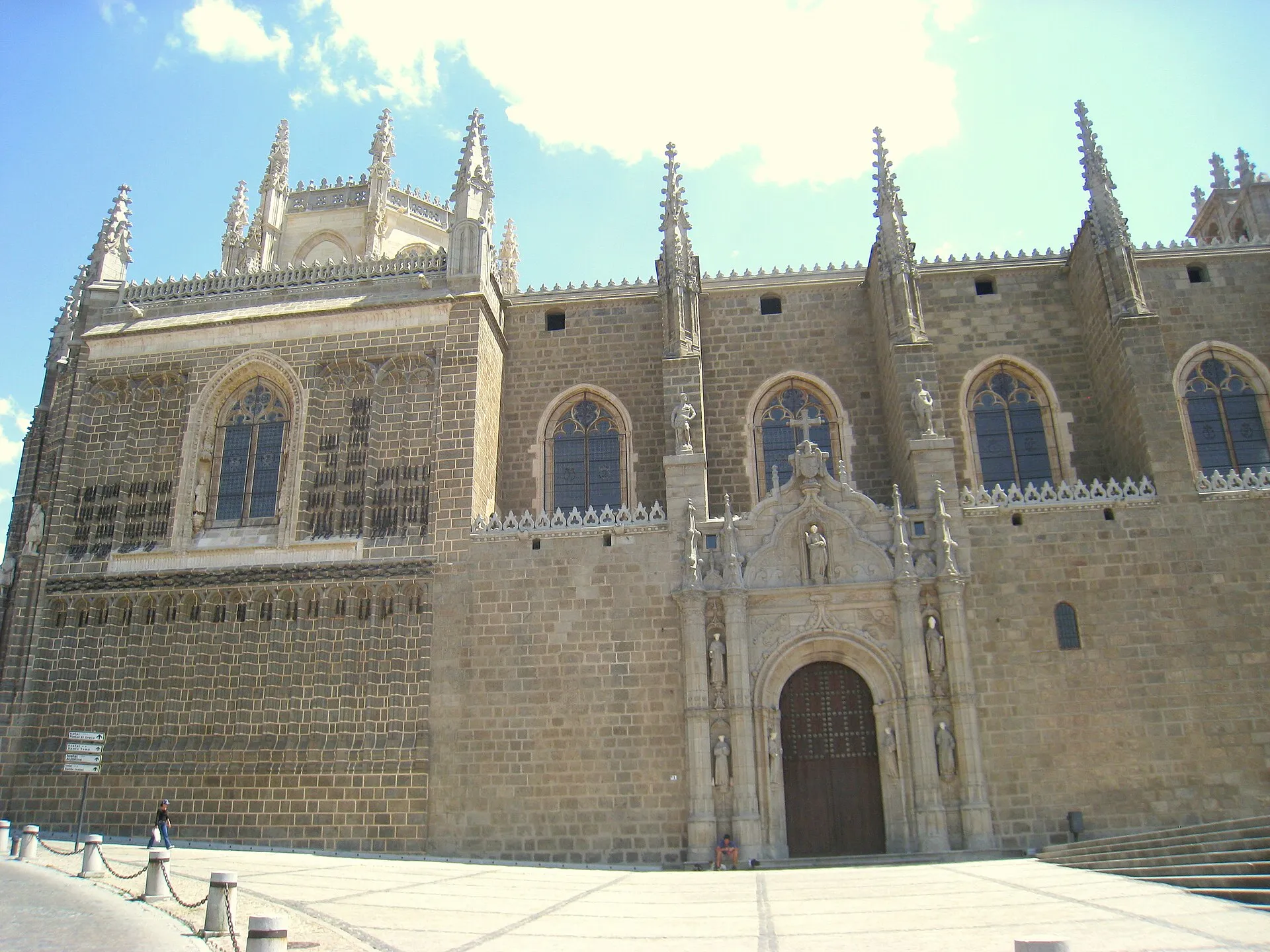 Monastery of San Juan de los Reyes with chains on its facade in Toledo
