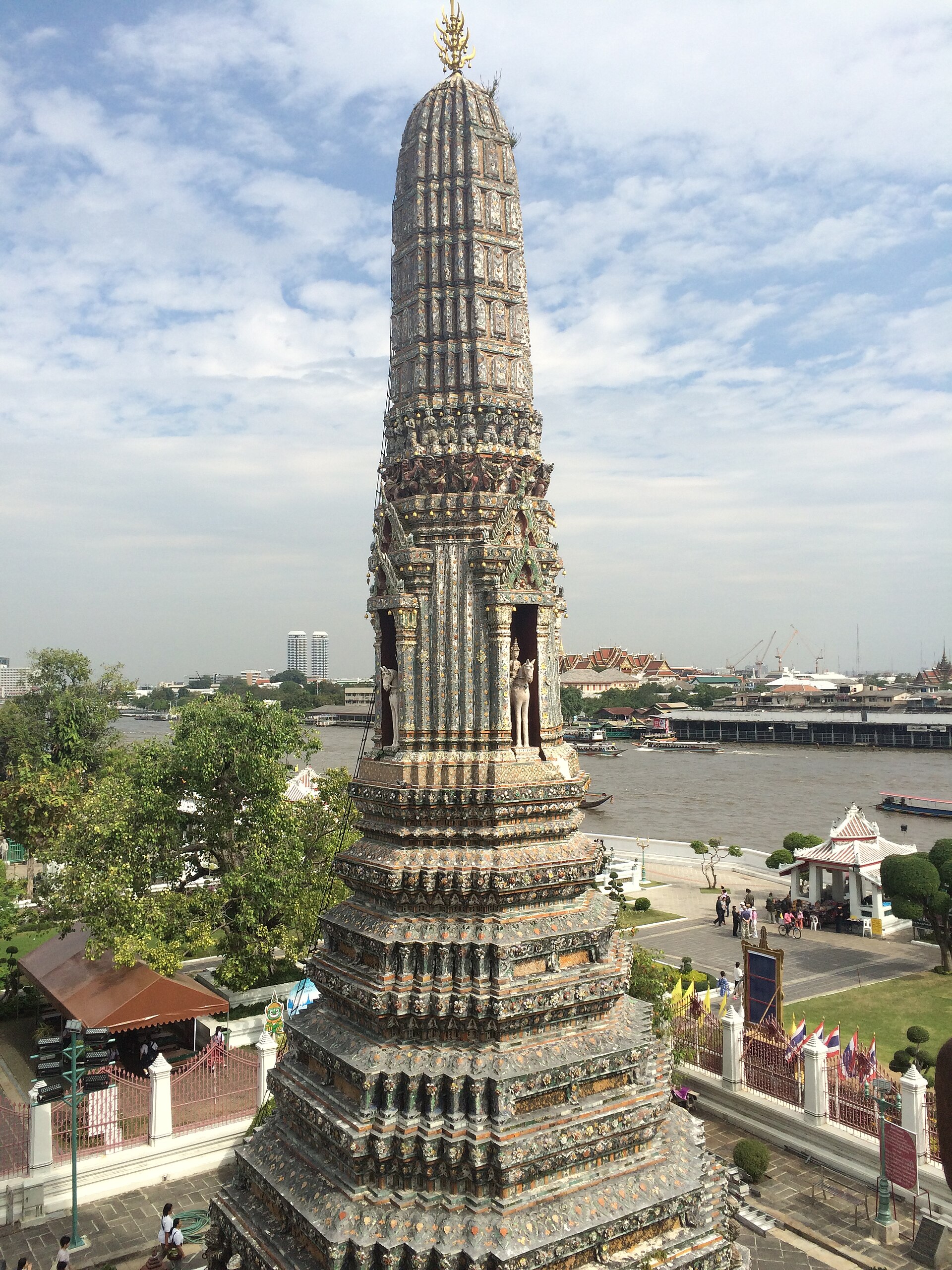 Wat Arun temple rising above the Chao Phraya River in Bangkok, Thailand