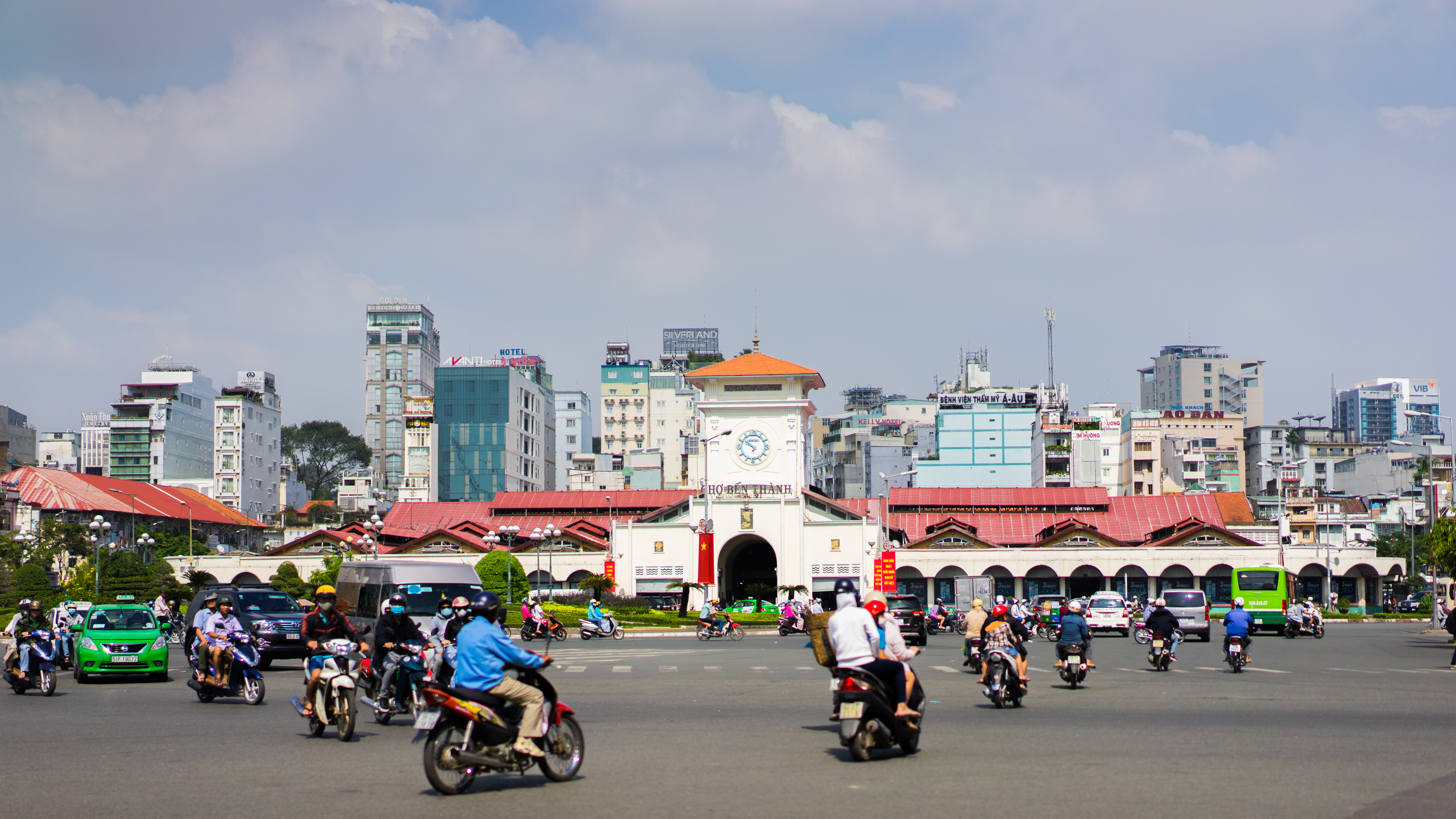 Ben Thanh Market in Ho Chi Minh City with its distinctive clock tower and busy street market entrance