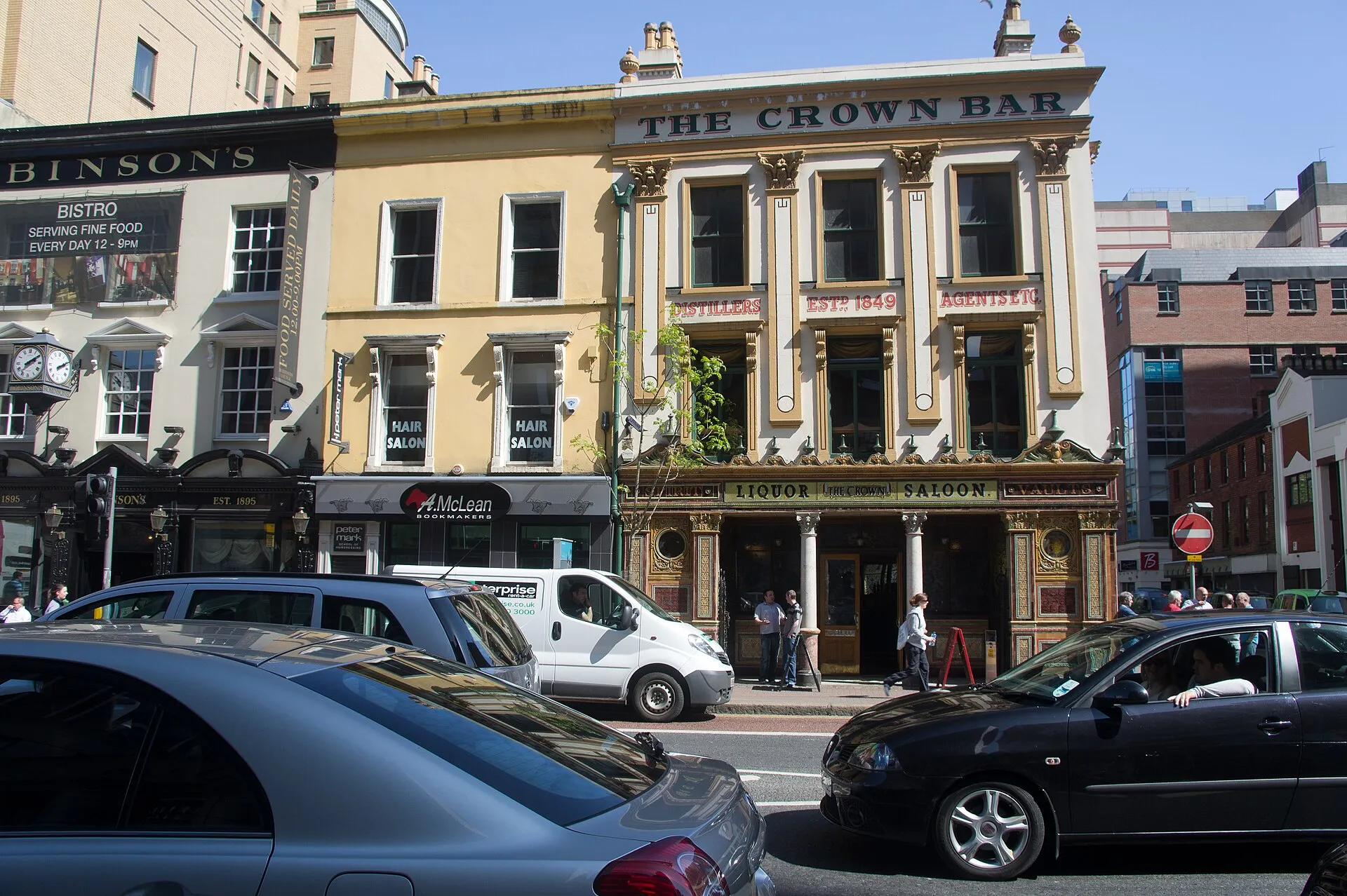 The ornate Victorian facade of the Crown Liquor Saloon on Great Victoria Street, Belfast