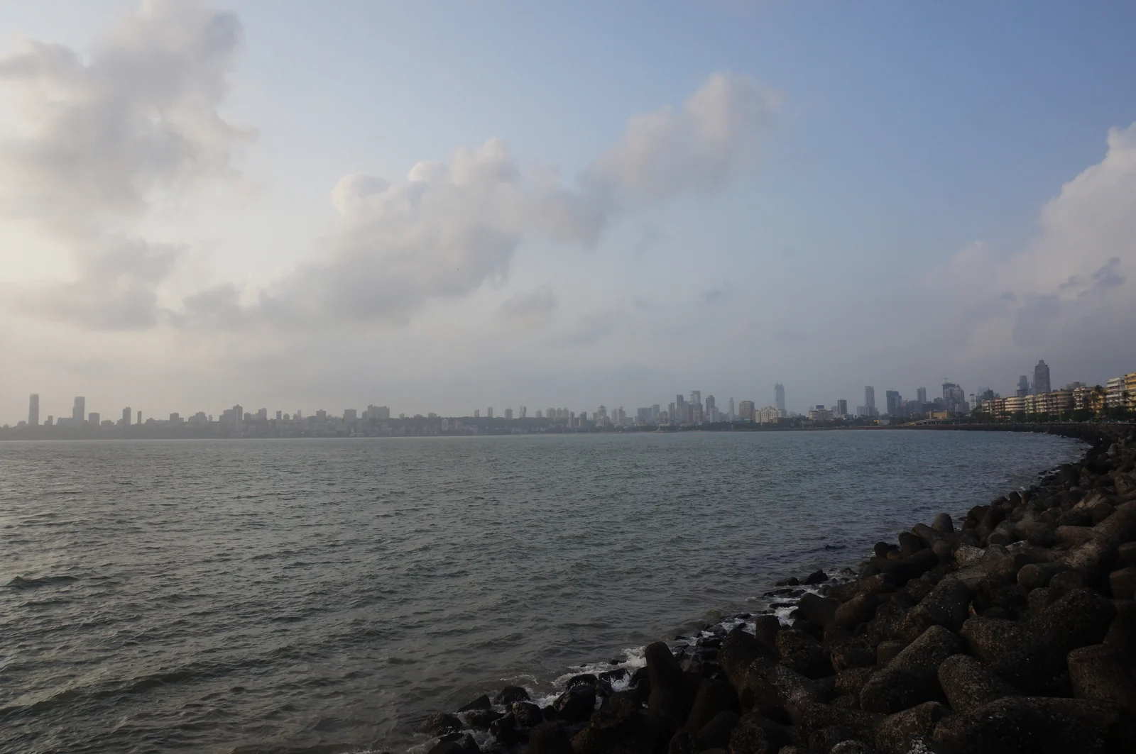 Mumbai's high-rise skyline seen across the bay from Marine Drive