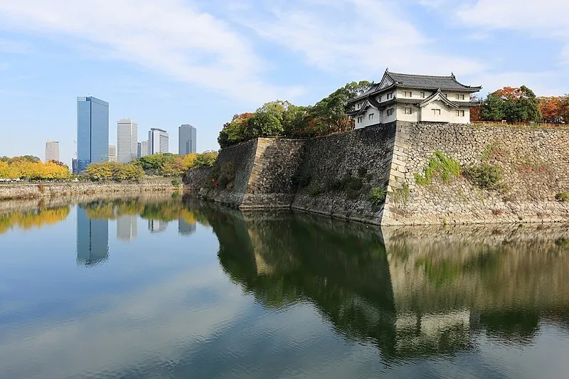 Osaka Castle outer moat with the Osaka Business Park skyline in the background