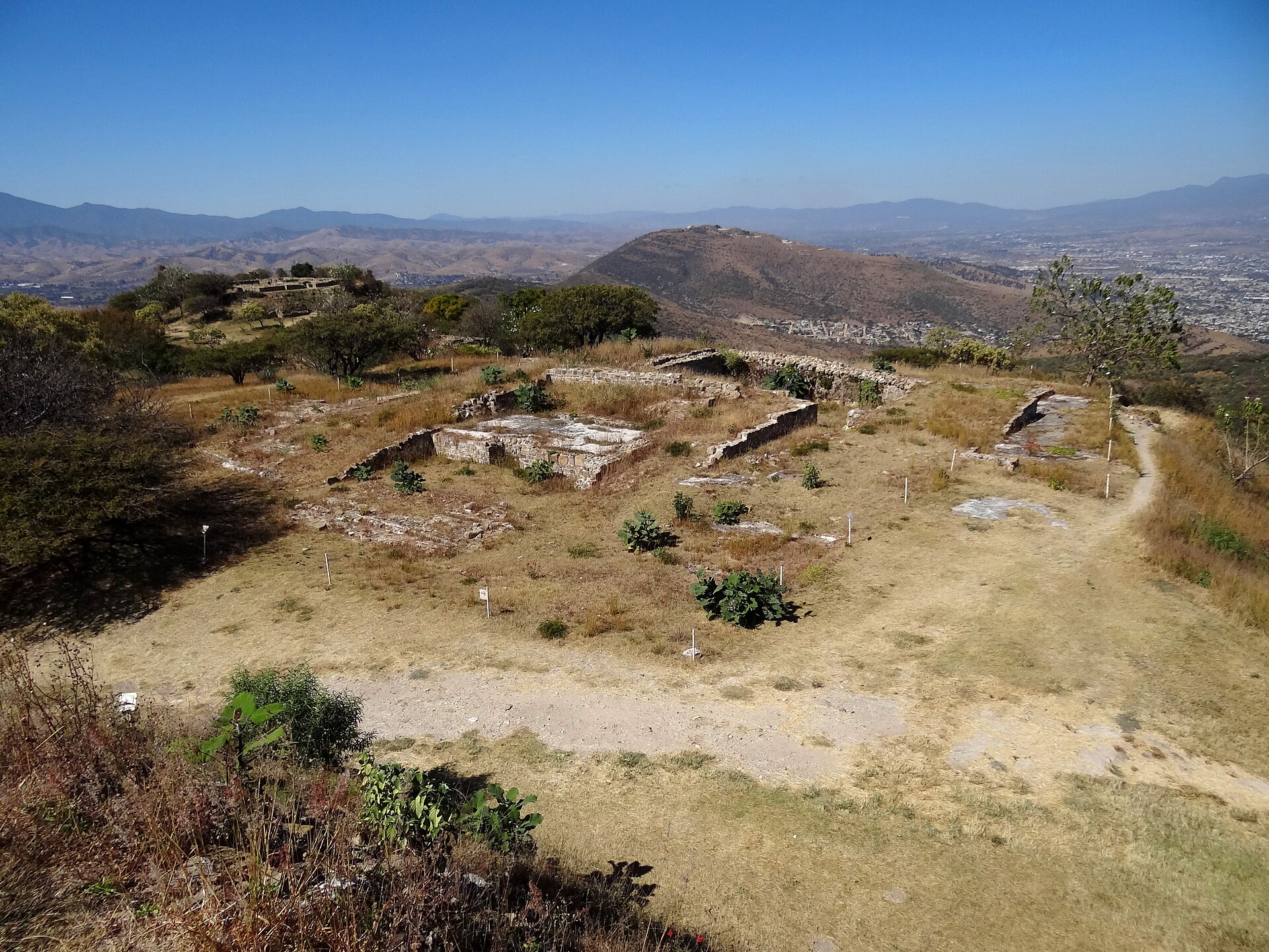 Panoramic view over the Monte Albán archaeological site with the Oaxaca Valley in the background