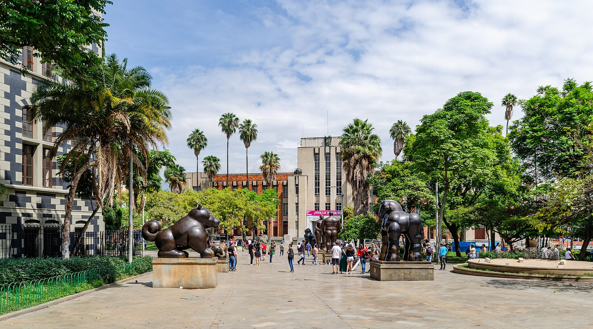 Botero sculptures in Plaza Botero with the Palace of Culture in Medellin, Colombia