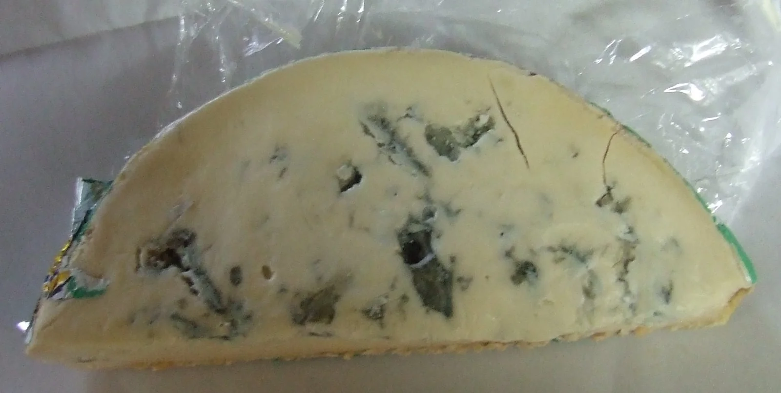 Cheese on display at a Queen Victoria Market deli stall