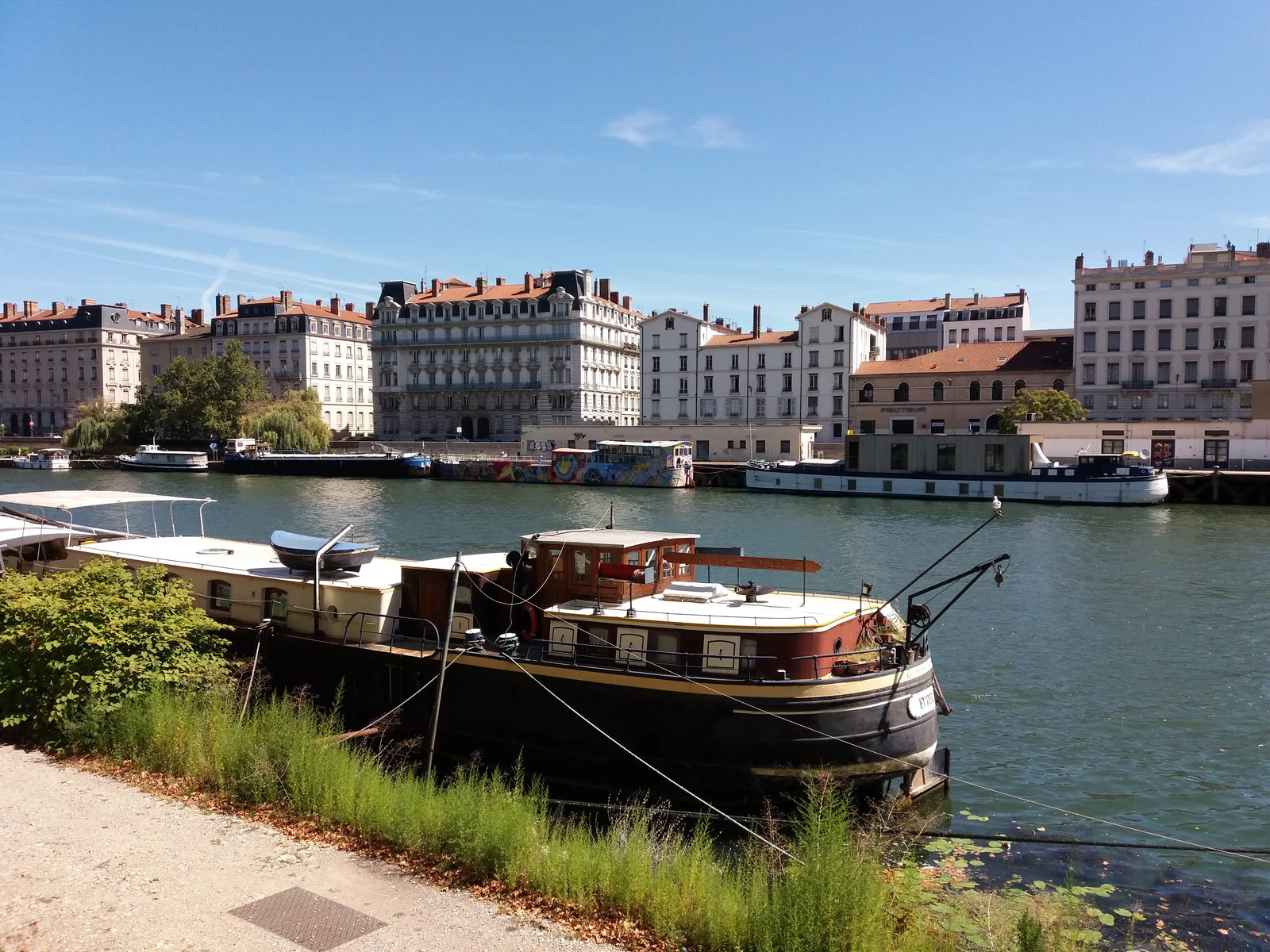 Barges moored along the Saone quays in Lyon