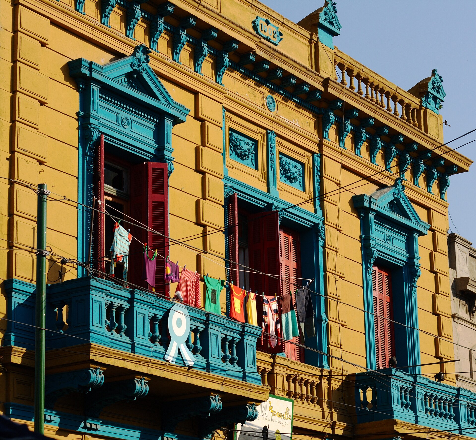 Colorful painted houses with balconies along Caminito street in the La Boca neighborhood of Buenos Aires
