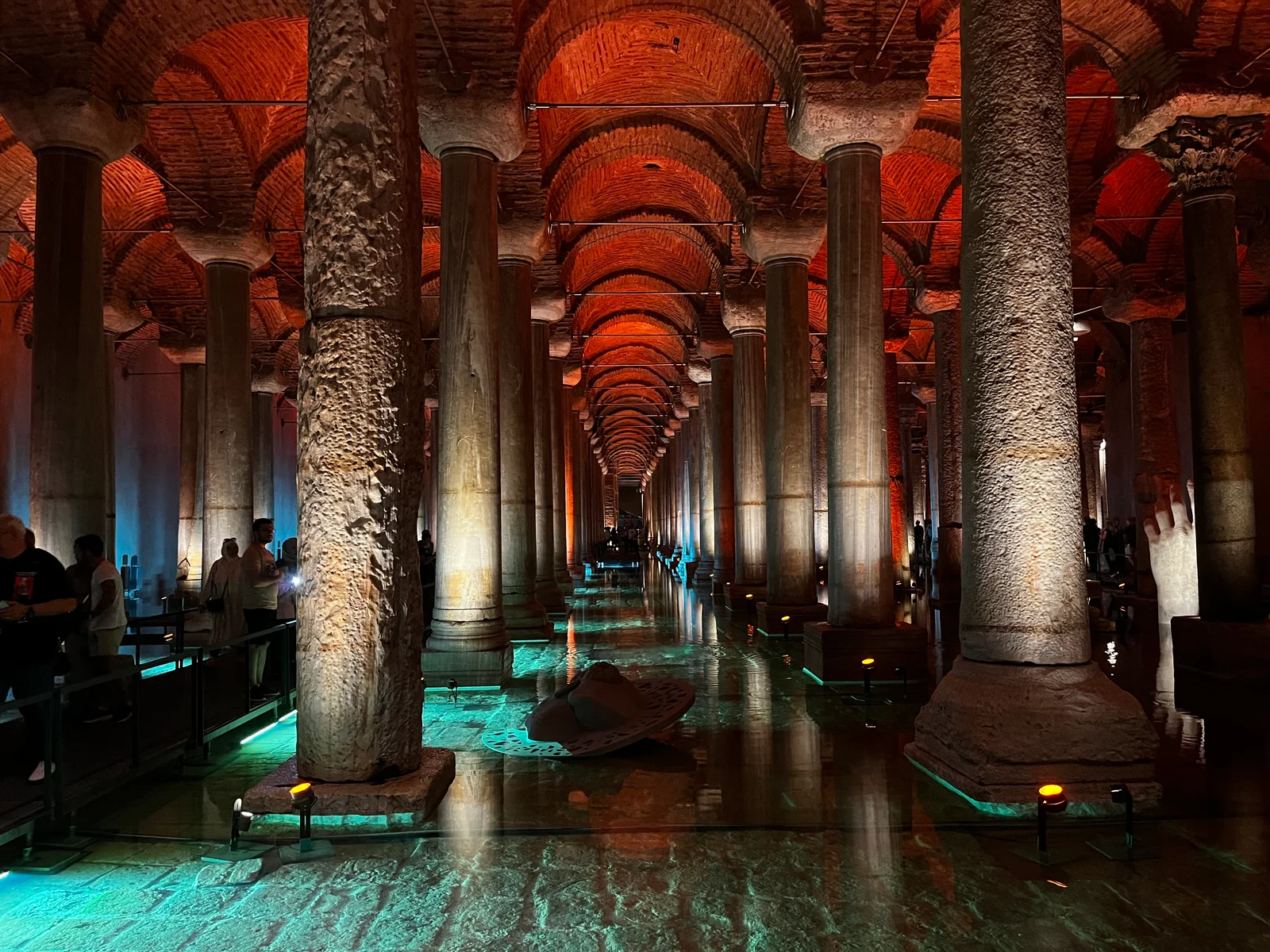 Walkway between lit columns inside the restored Basilica Cistern