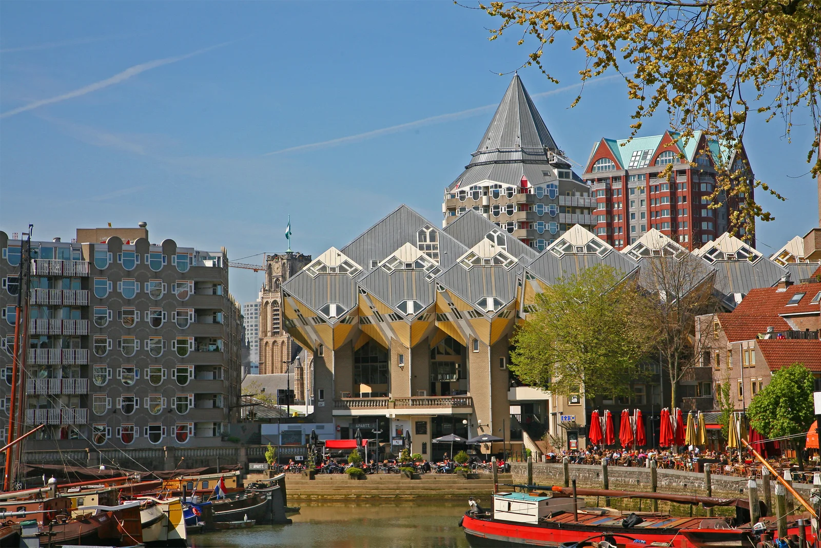 Rotterdam's tilted yellow Cube Houses seen from ground level