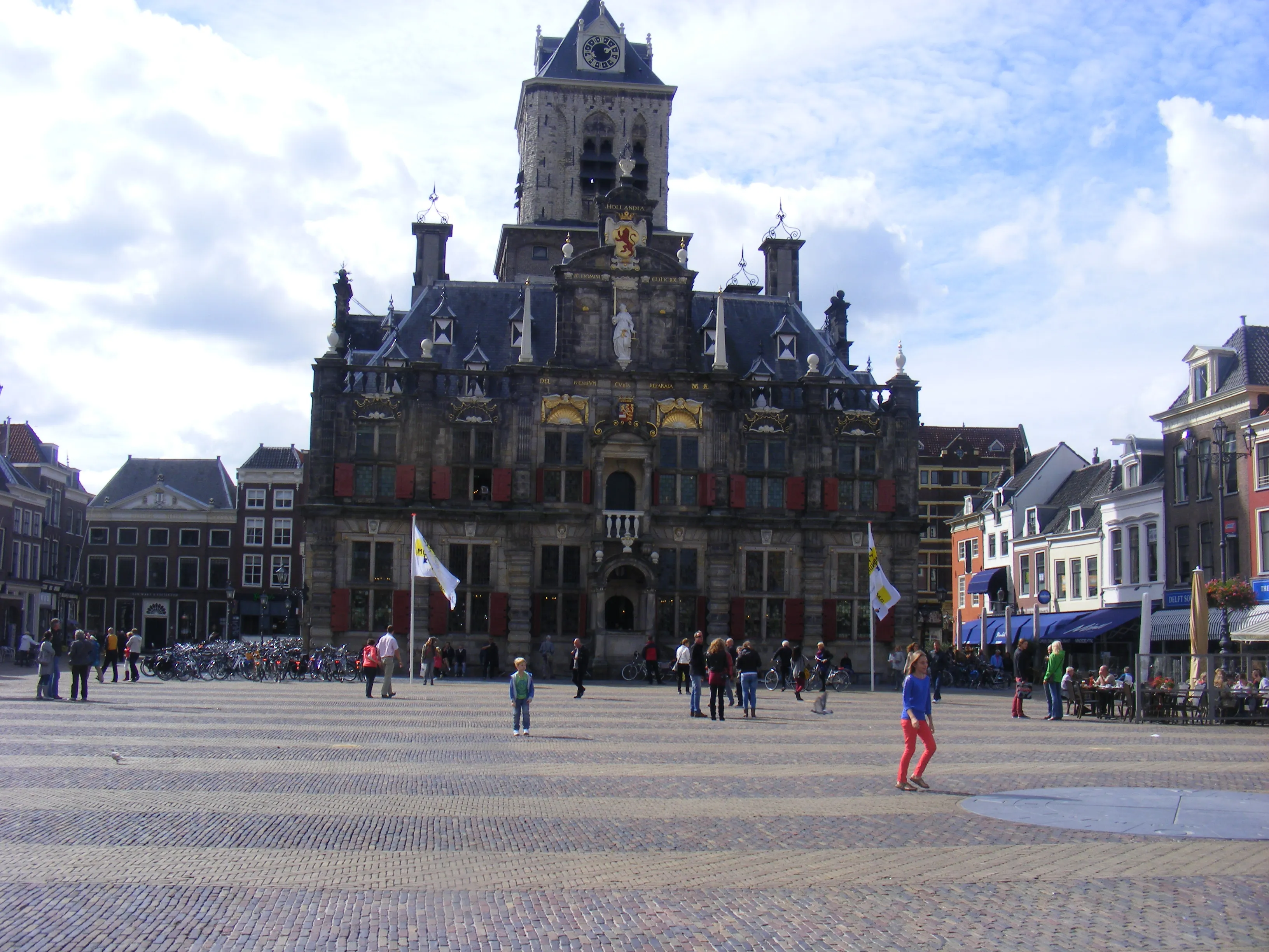 The red-shuttered Renaissance facade of Delft City Hall on the Markt
