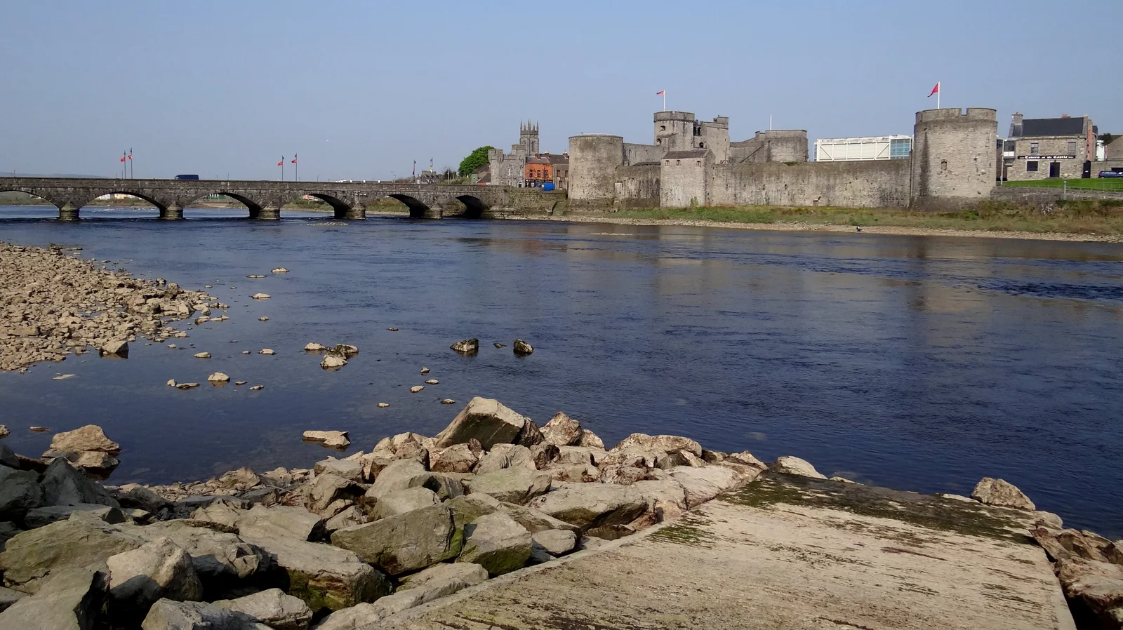 The round Norman towers of King John's Castle on the Shannon in Limerick