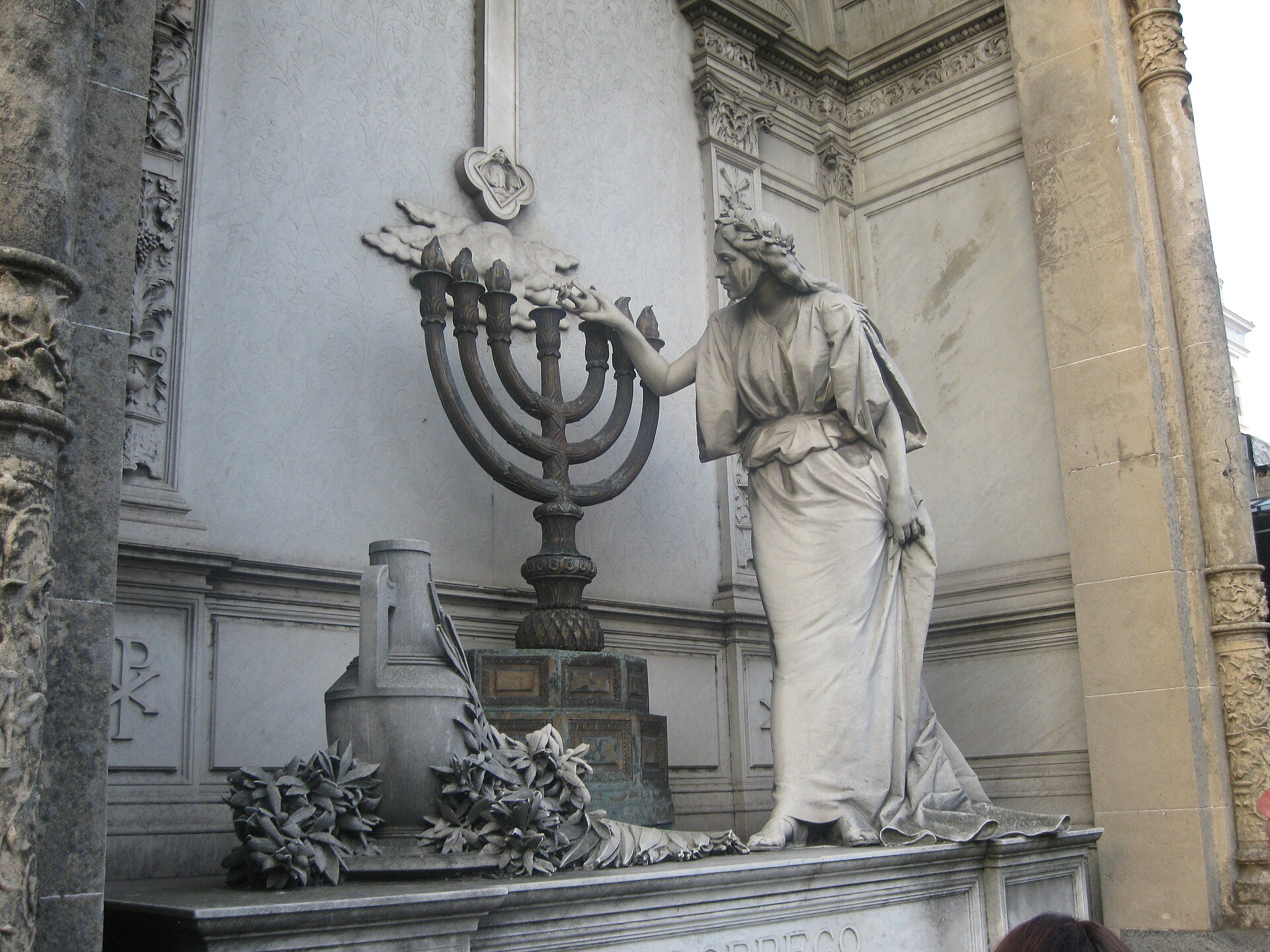 Ornate mausoleum with sculptural details in the historic Recoleta Cemetery, Buenos Aires